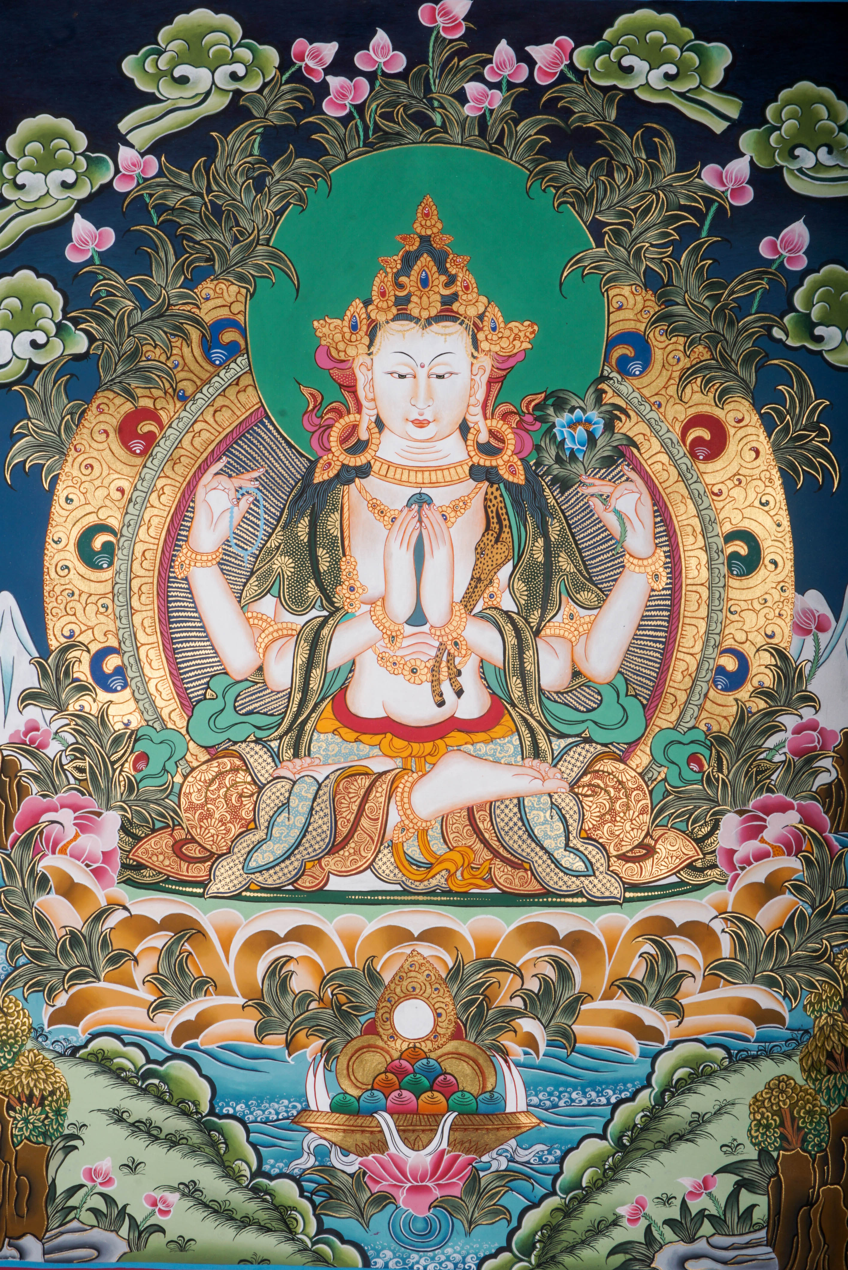 This authentic Chenrezig Thangka is a Tibetan Buddhist masterpiece that captures the Bodhisattva of Compassion in vibrant color and fine detail, bringing peace, empathy, and spiritual grace into your space.