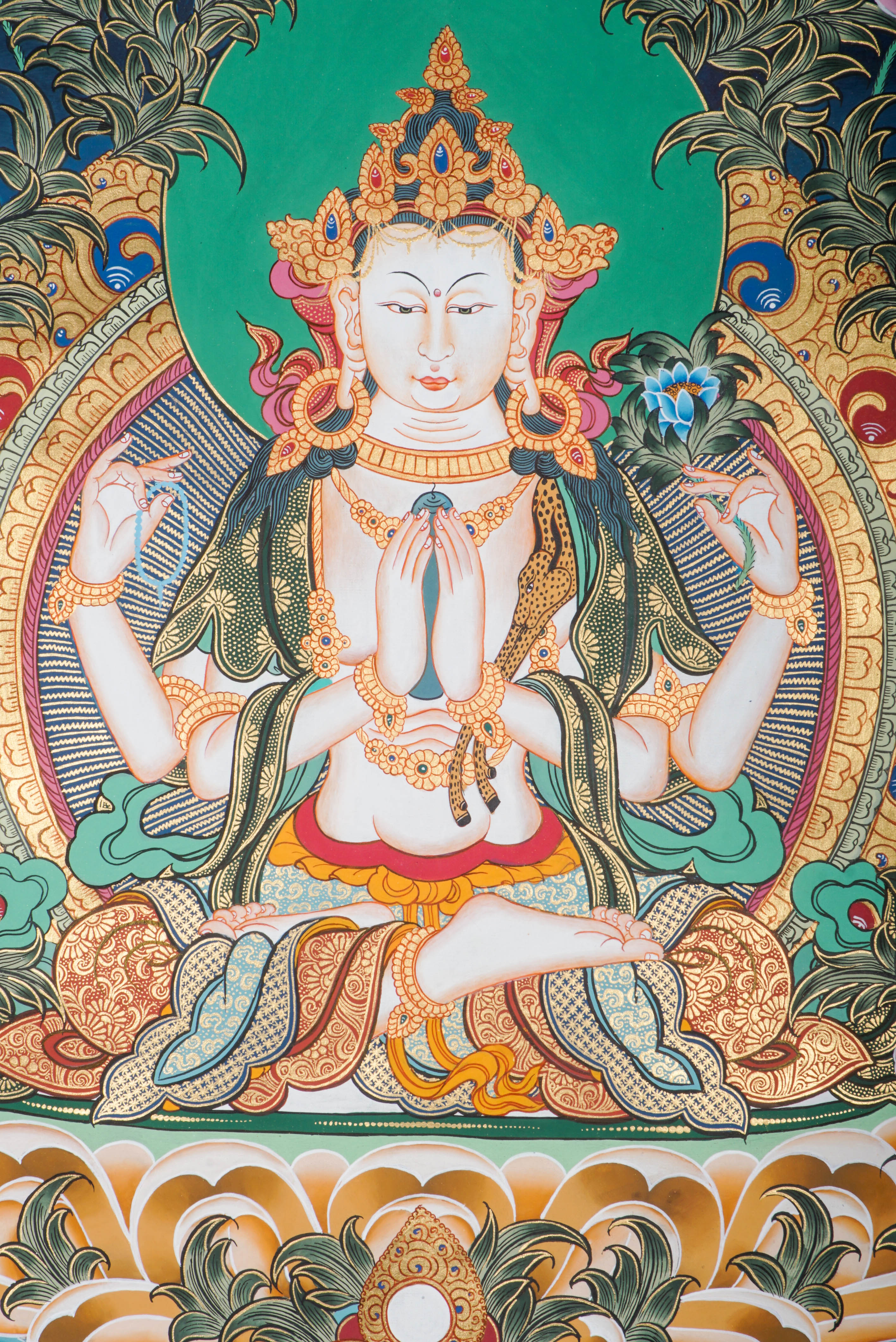This authentic Chenrezig Thangka is a Tibetan Buddhist masterpiece that captures the Bodhisattva of Compassion in vibrant color and fine detail, bringing peace, empathy, and spiritual grace into your space.