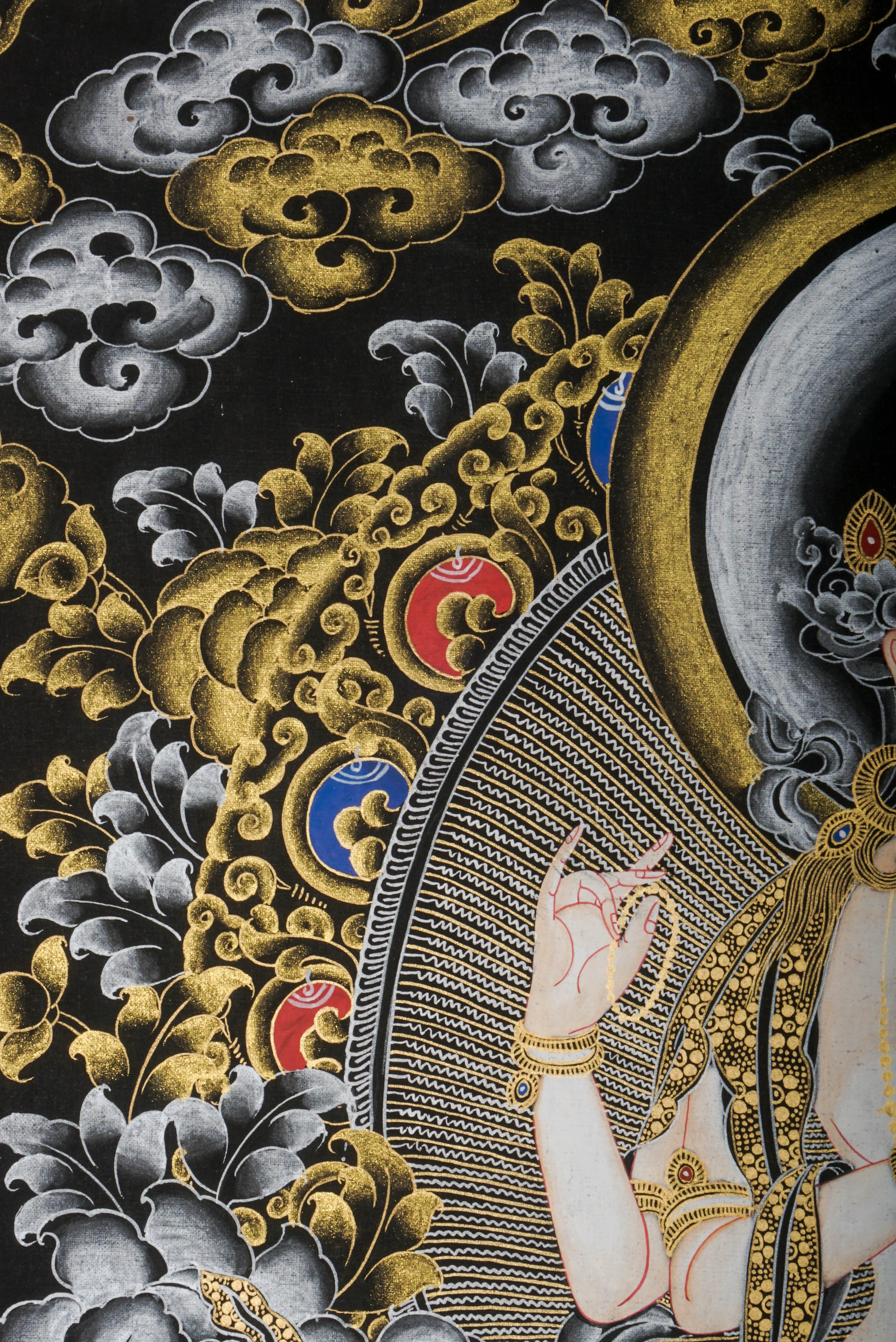 This genuine Tibetan Chenrezig Thangka, hand-painted with natural pigments, radiates compassion and serenity—perfect for inviting peace and loving energy into your space.