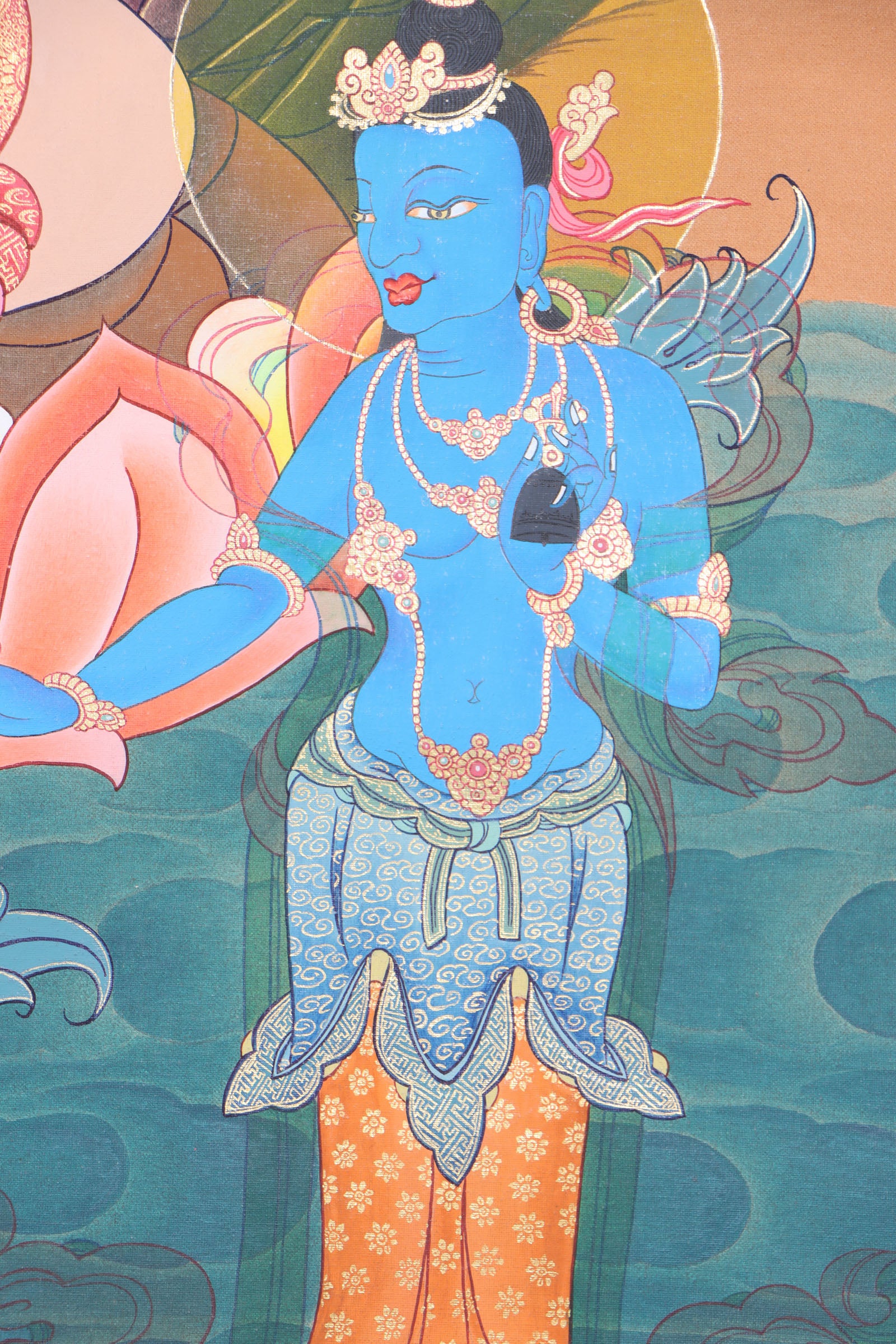 Chenrezig, the deity of compassion in Tibetan Buddhism, is beautifully depicted in this hand-painted Thangka made with natural mineral pigments. A spiritual and artistic piece, it serves as a reminder of compassion and a powerful aid for meditation and mindfulness.