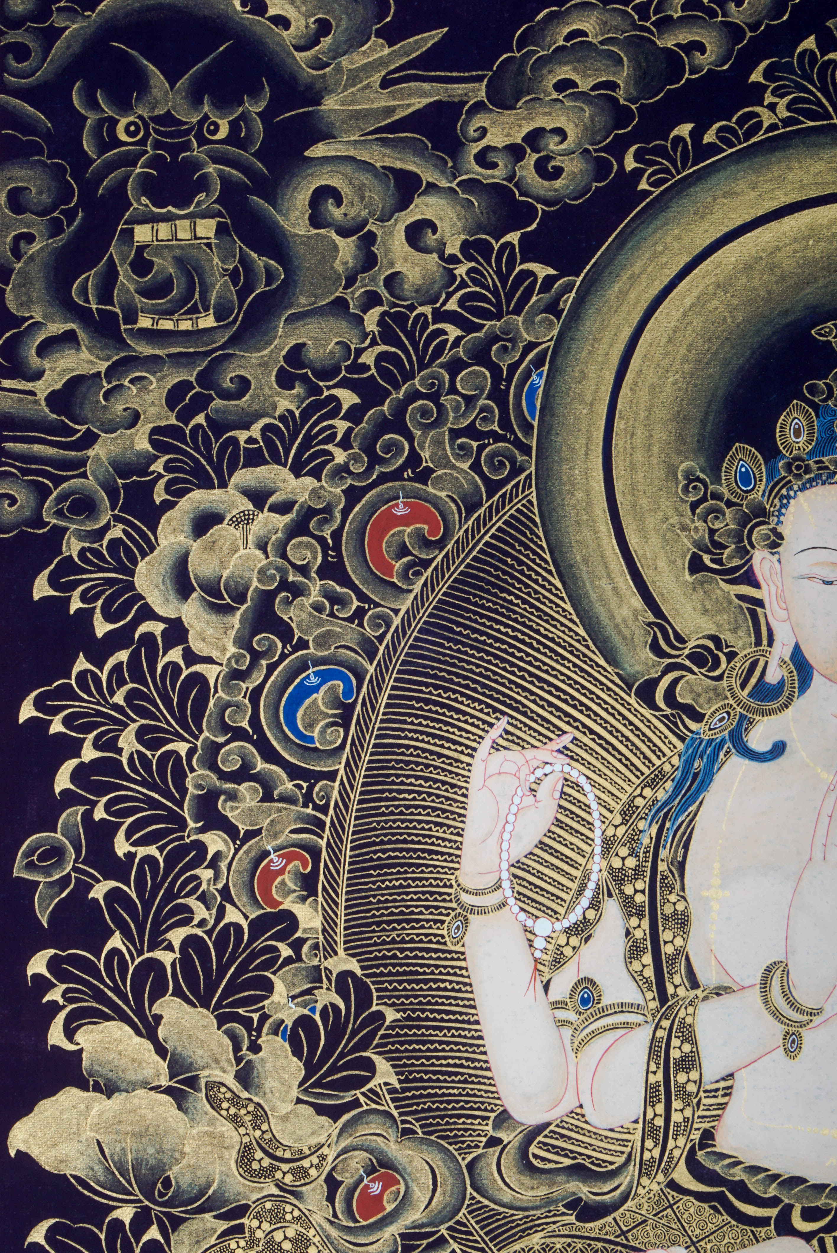 The Chengresi Thangka Painting portrays Chenrezig, the Bodhisattva of Compassion in Tibetan Buddhism, symbolizing love, healing, and kindness through sacred detail and traditional artistry.