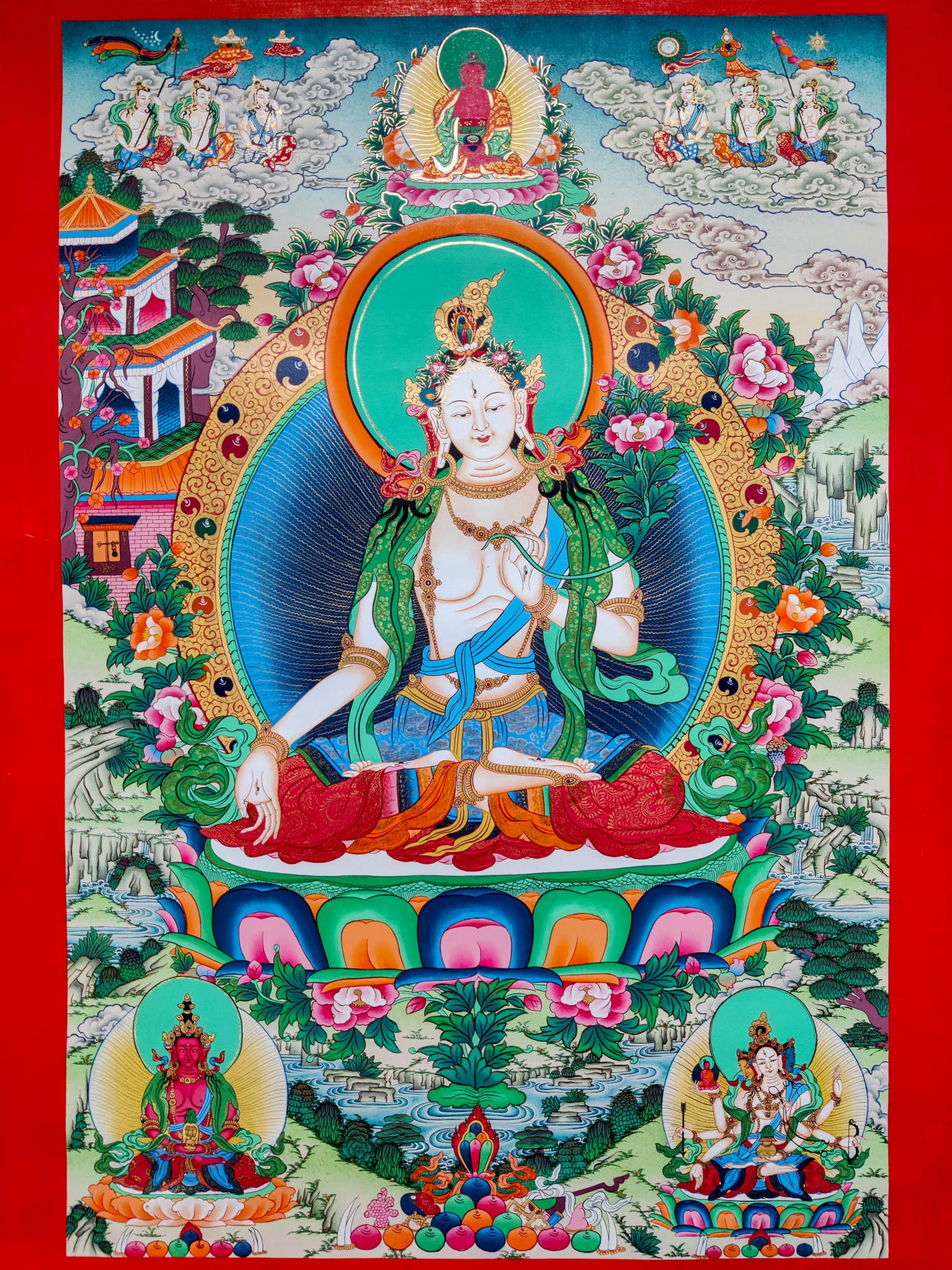 The White Thangka Painting is hand-painted in 24k gold leaf accents, as a sign of heavenly blessings and purity.