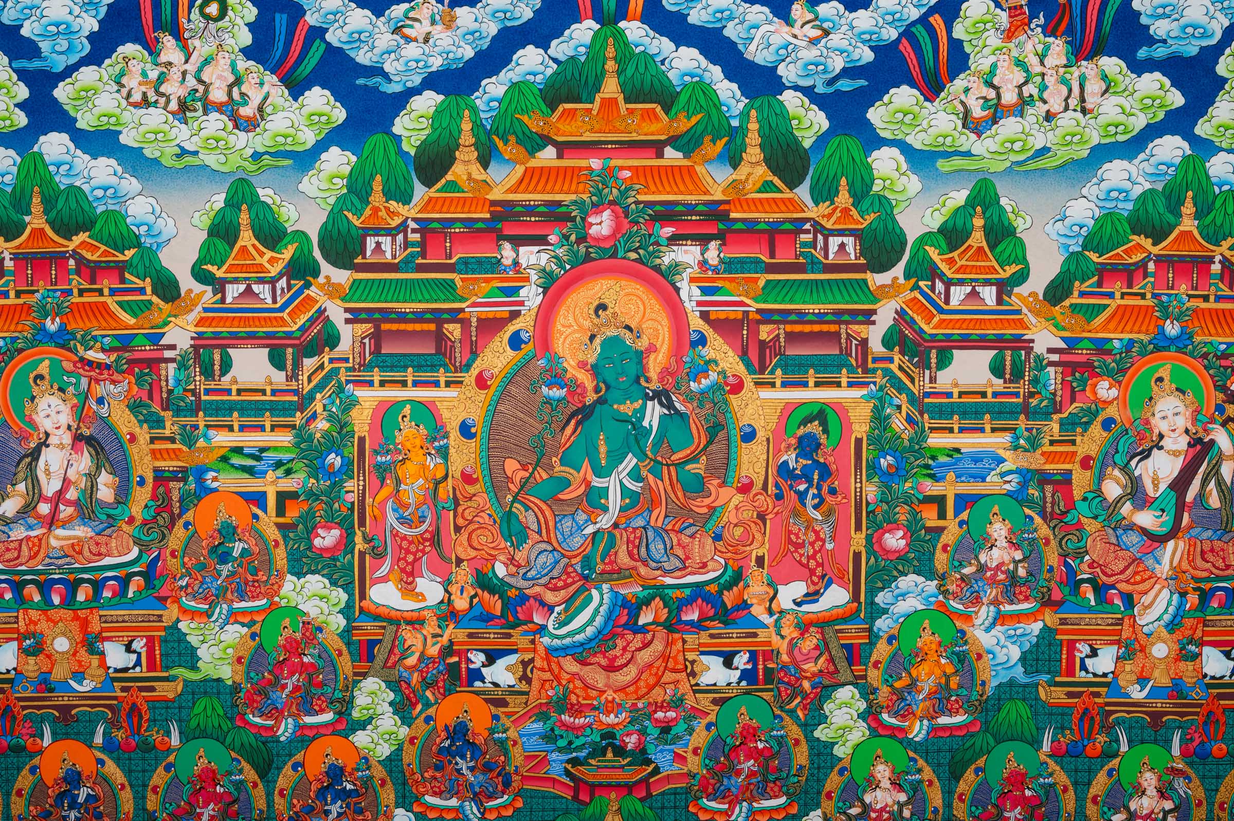 Exclusive Green Tara Thangka with Saraswati and Dukkar on either side, surrounded by mini deities in traditional Tibetan Buddhist art style. 
