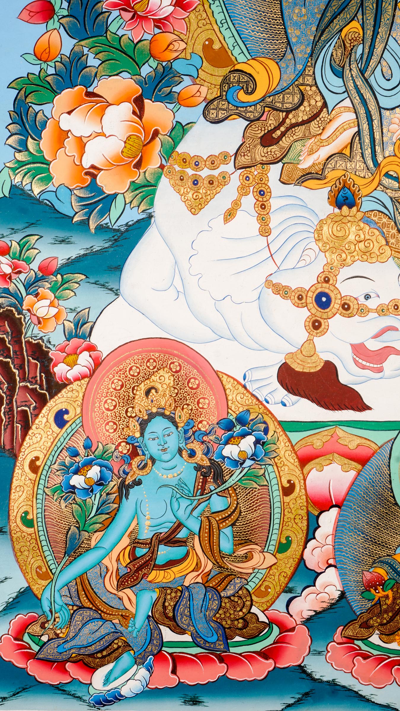 Tibetan thangka of Tara on a white elephant holding a lotus and blessing mudra, surrounded by celestial beings, clouds, and floral patterns.