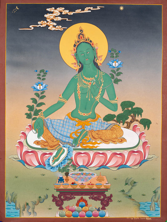 This hand-painted Thangka is a spiritual portal that invites you to immerse yourself in the divine energy of Green Tara.