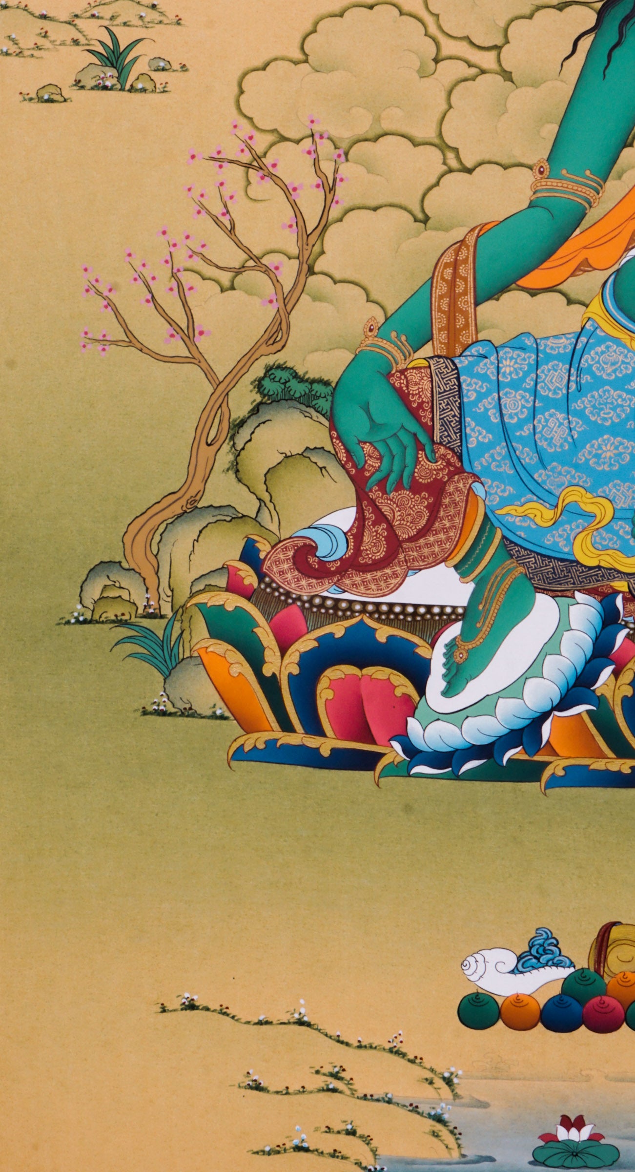 The Green Tara Thangka Painting features the compassionate Tibetan Buddhist goddess known for her swift protection and fearless energy. Hand-painted using traditional methods and natural pigments, this genuine Thangka radiates Green Tara’s benevolence and is a powerful symbol of courage, healing, and divine support.