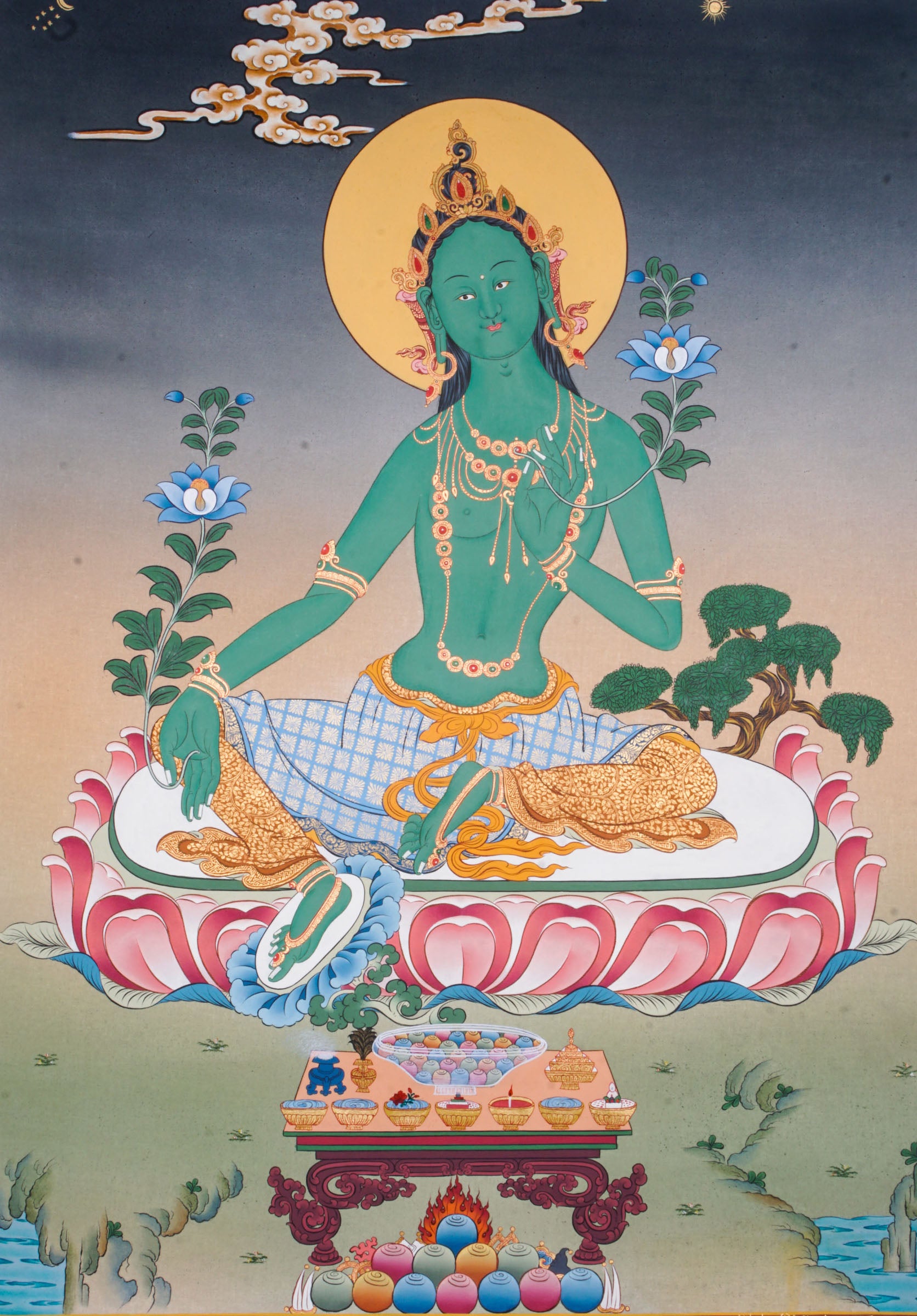 Green Tara Thangka is a Tibetan Buddhist artwork of the goddess of compassion and protection. Her green form symbolizes swift action, healing, and the removal of obstacles. 