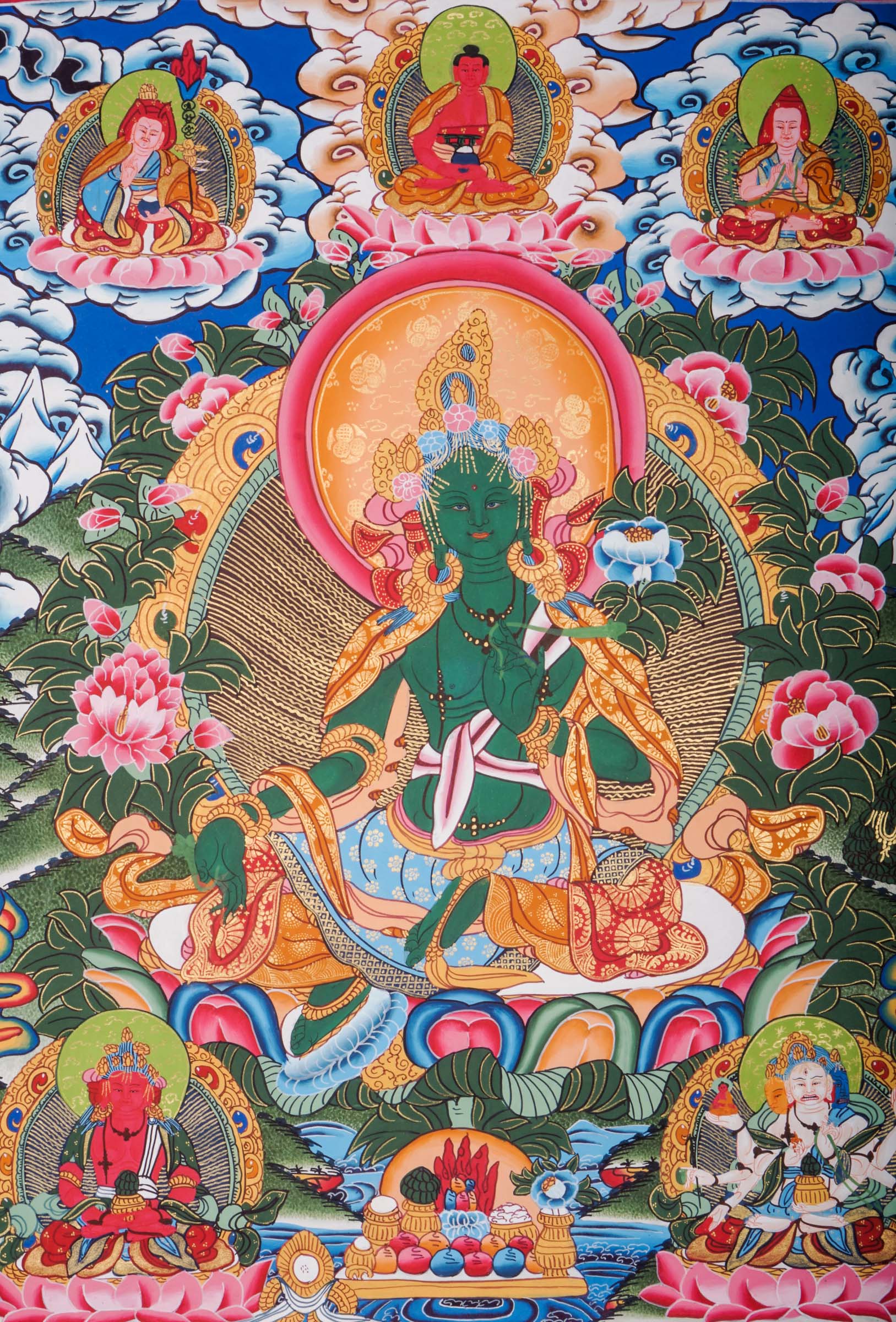 This genuine Tibetan Green Tara Thangka showcases the goddess of compassion and protection, hand-painted with natural pigments in traditional Himalayan style.
