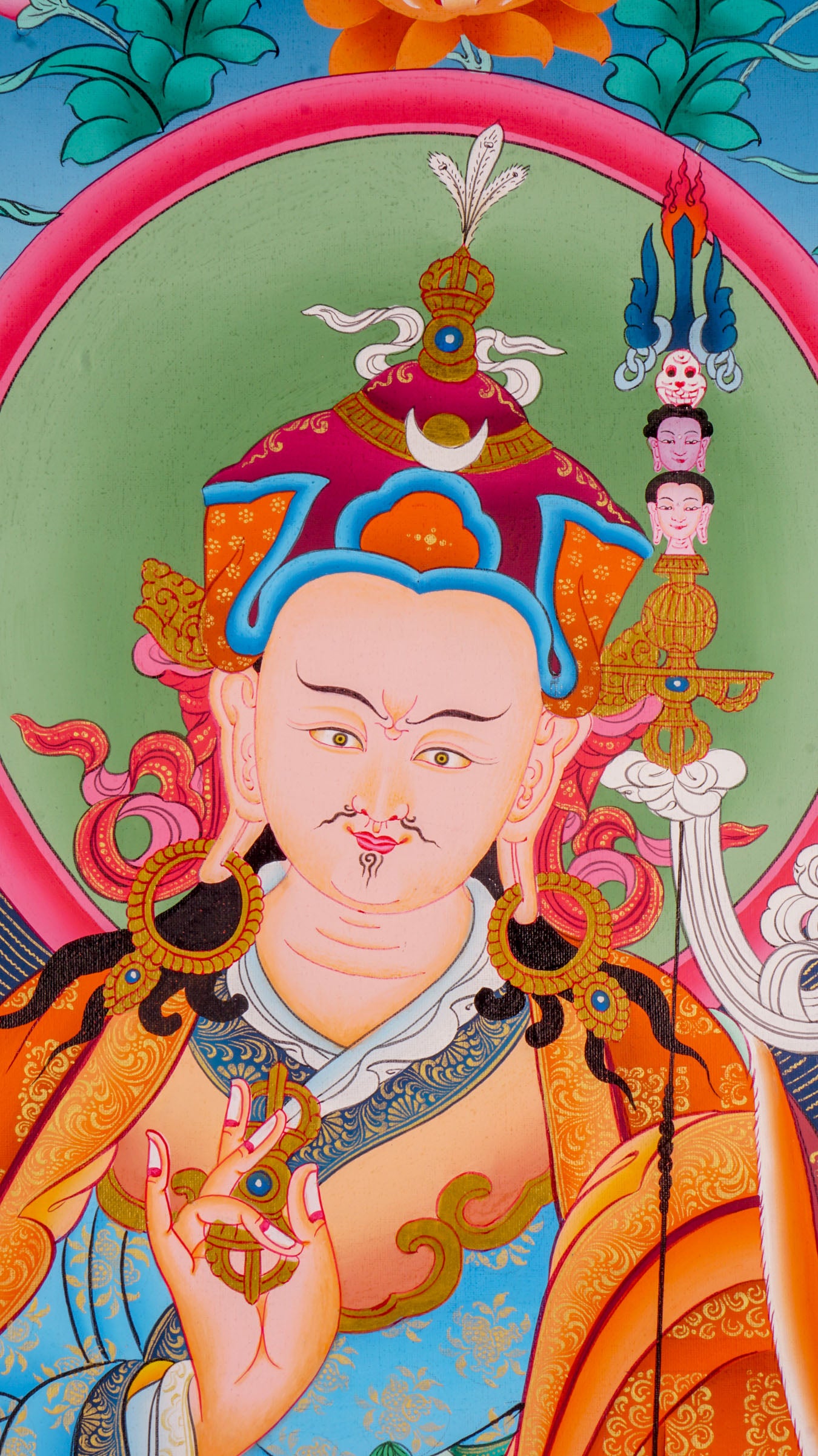 The Thangka artwork depicting Guru Rinpoche, a symbol representing Buddhist teachings and traditions.