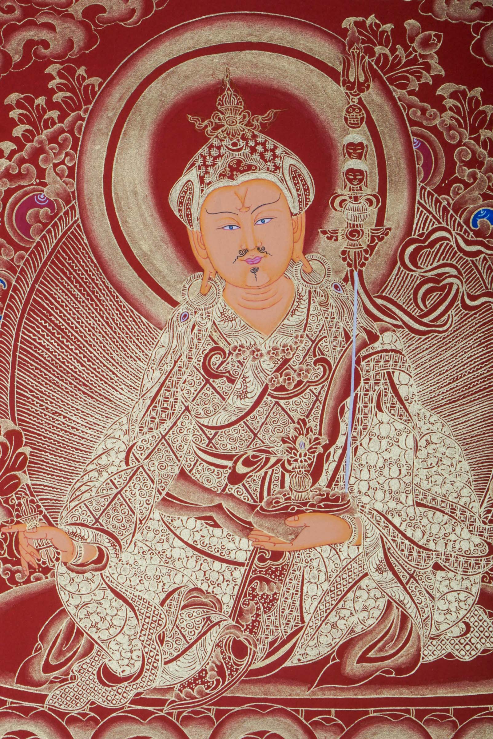 This genuine Tibetan Guru Padmasambhava Thangka honors the Lotus-Born master, symbolizing wisdom, protection, and spiritual power. Hand-painted with rich colors and sacred detail, it radiates blessings through the mantra Om Ah Hum Vajra Guru Padma Siddhi Hum.