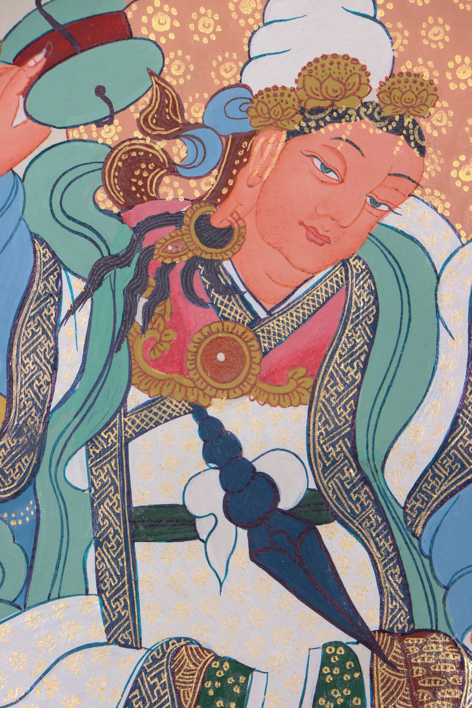 Guru Padmasambhava, the "Second Buddha," brought Buddhism to Tibet and is revered for his wisdom and spiritual power. This authentic Thangka, hand-painted with natural pigments, beautifully depicts his enlightened presence for meditation and devotion.