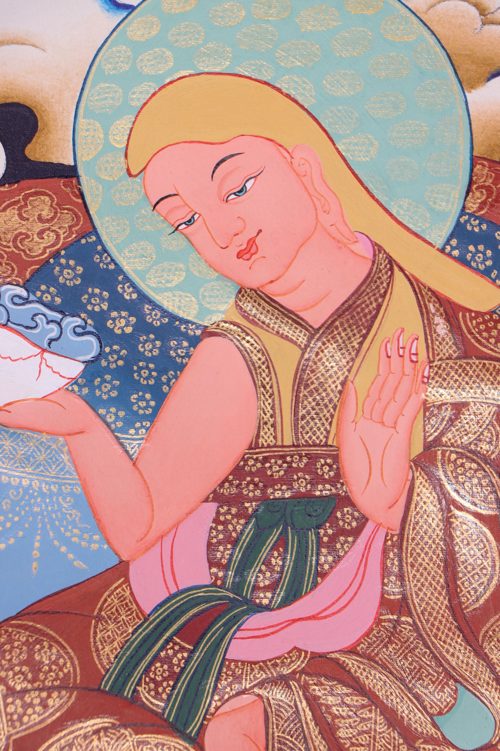 Guru Padmasambhava, the "Second Buddha," brought Buddhism to Tibet and is revered for his wisdom and spiritual power. This authentic Thangka, hand-painted with natural pigments, beautifully depicts his enlightened presence for meditation and devotion.