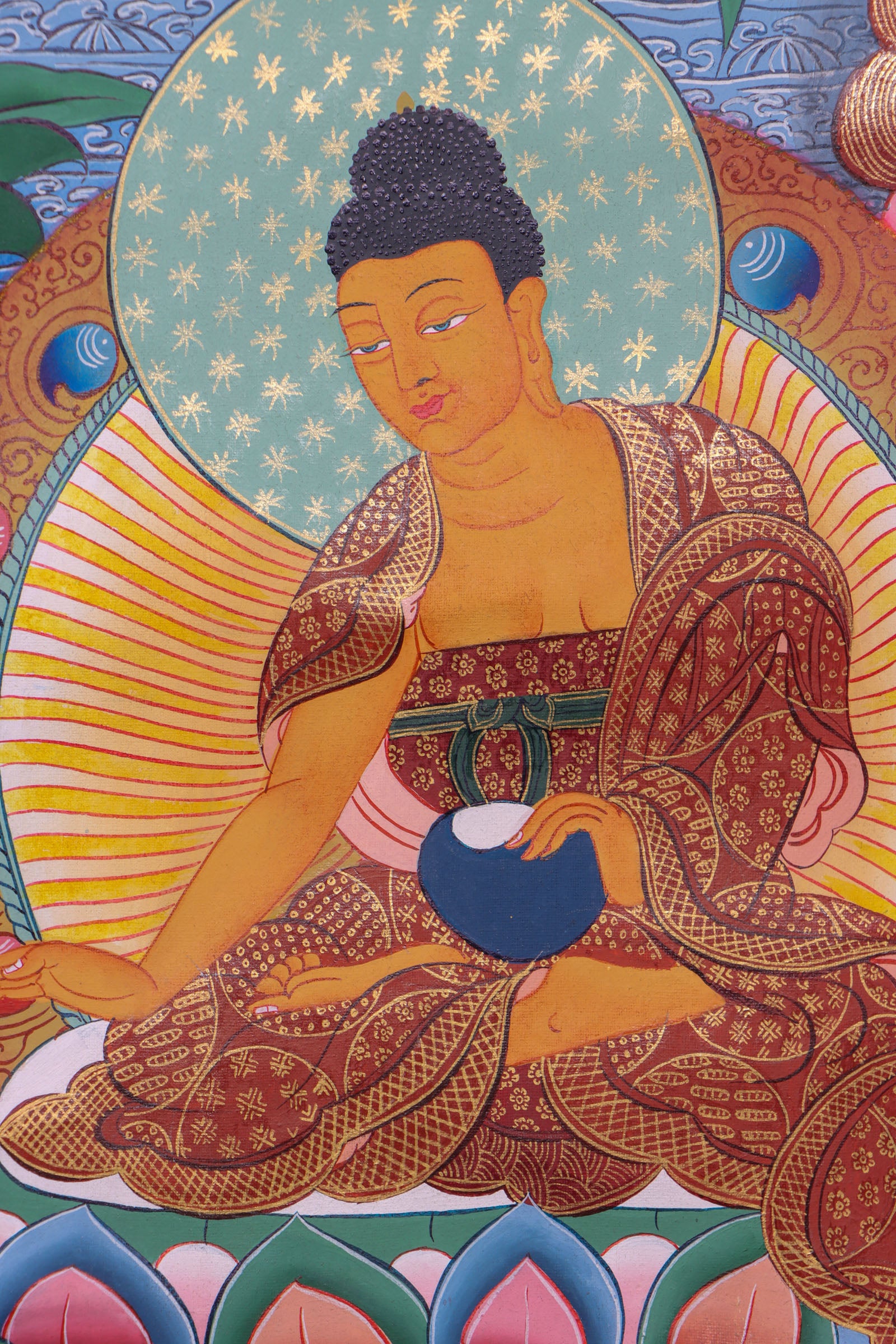 Guru Padmasambhava, the "Second Buddha," brought Buddhism to Tibet and is revered for his wisdom and spiritual power. This authentic Thangka, hand-painted with natural pigments, beautifully depicts his enlightened presence for meditation and devotion.