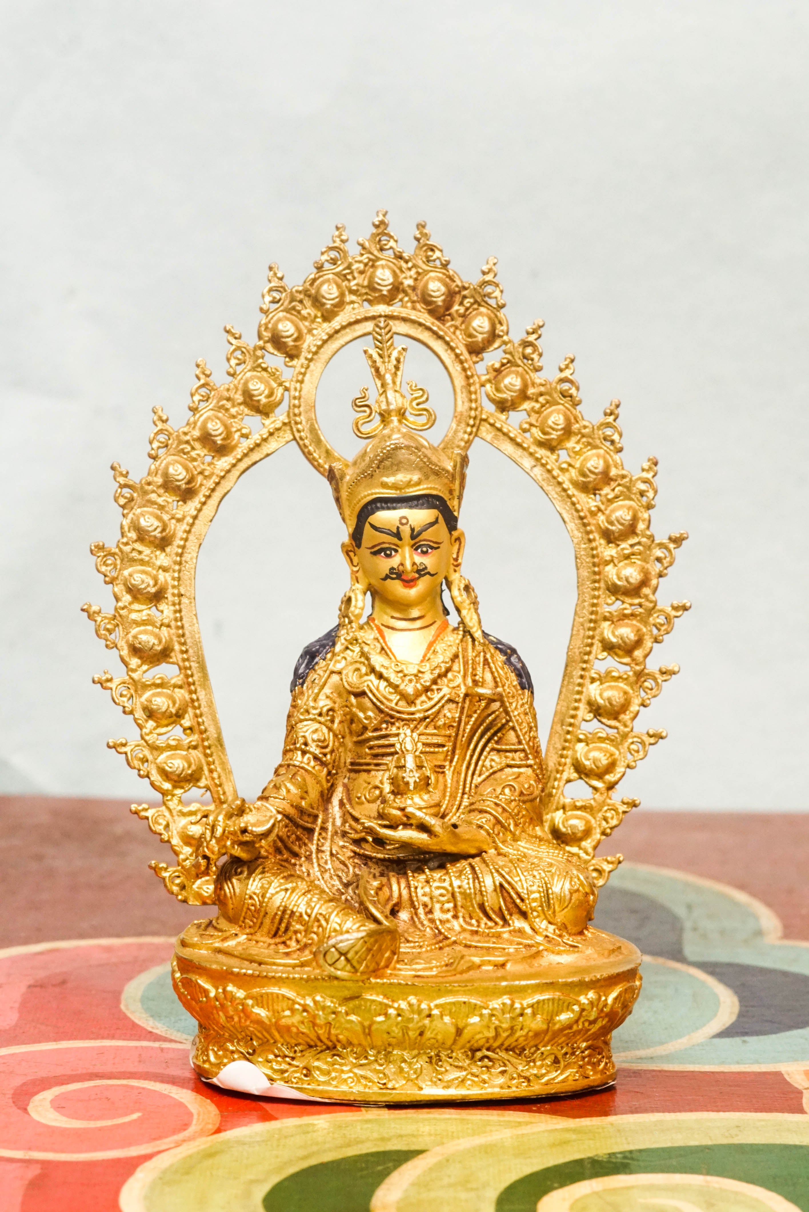Statue of a guru, a spiritual teacher and guide, symbolizing wisdom, compassion, and the transmission of sacred teachings.