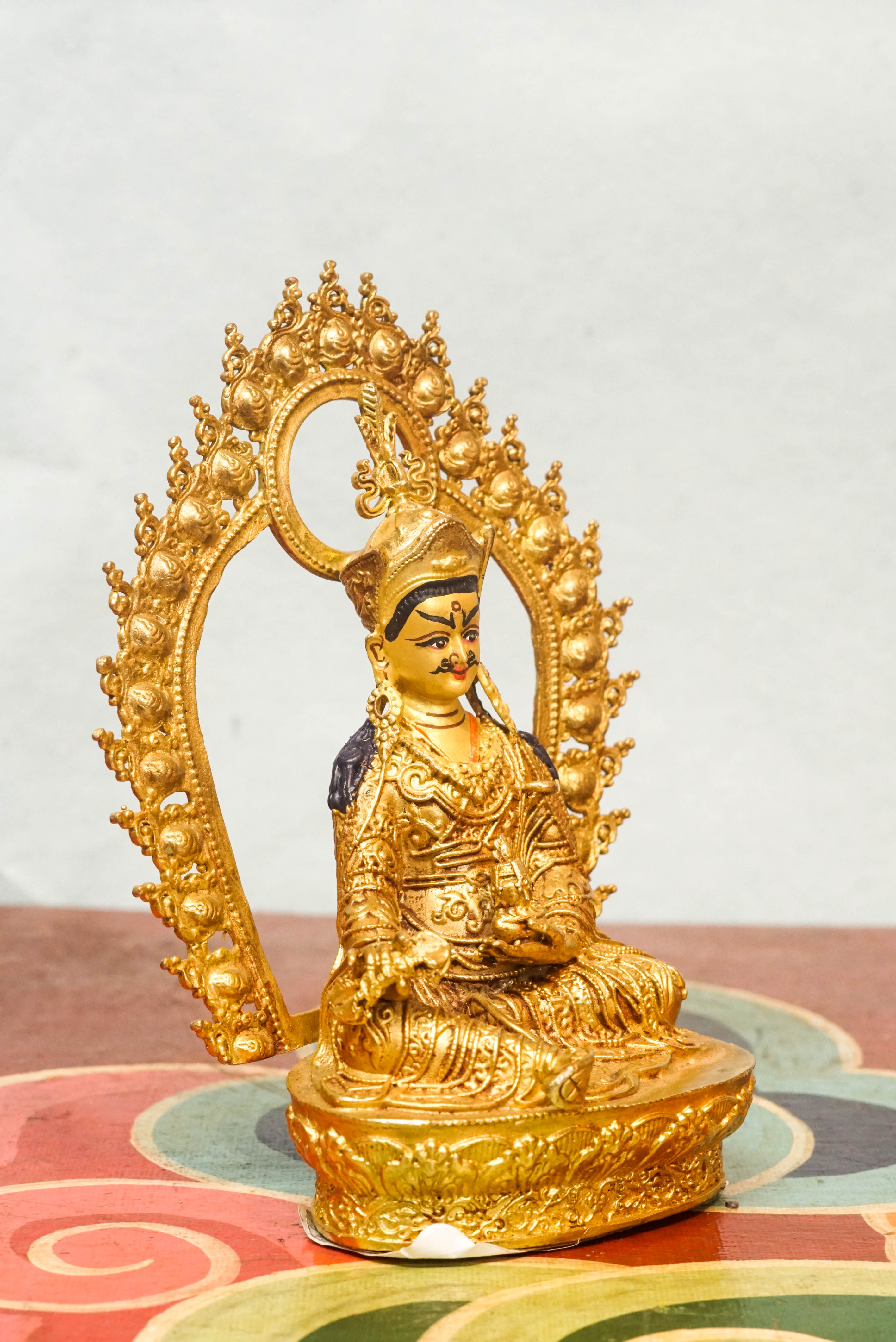 Statue of a guru, a spiritual teacher and guide, symbolizing wisdom, compassion, and the transmission of sacred teachings.