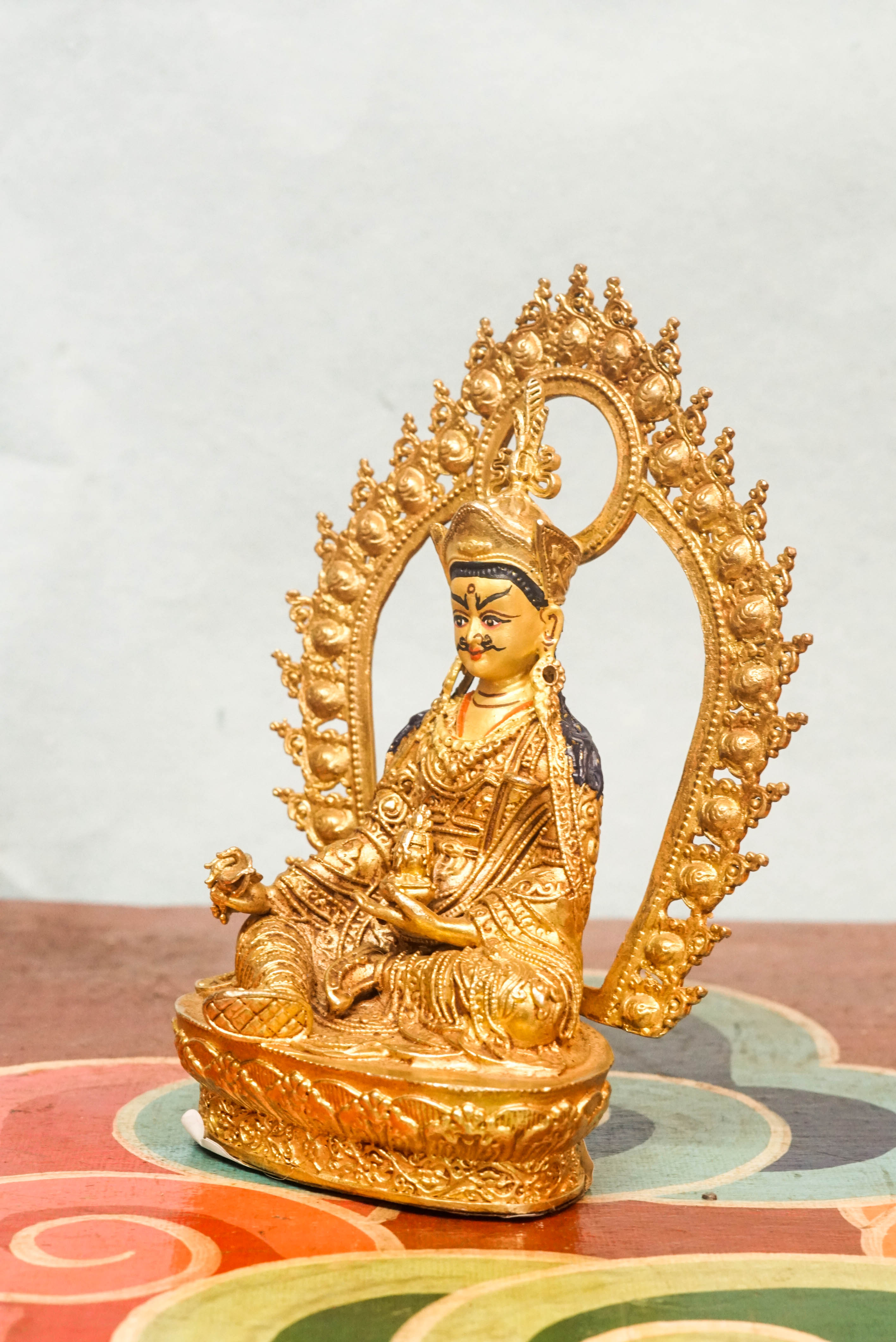 Statue of a guru, a spiritual teacher and guide, symbolizing wisdom, compassion, and the transmission of sacred teachings.