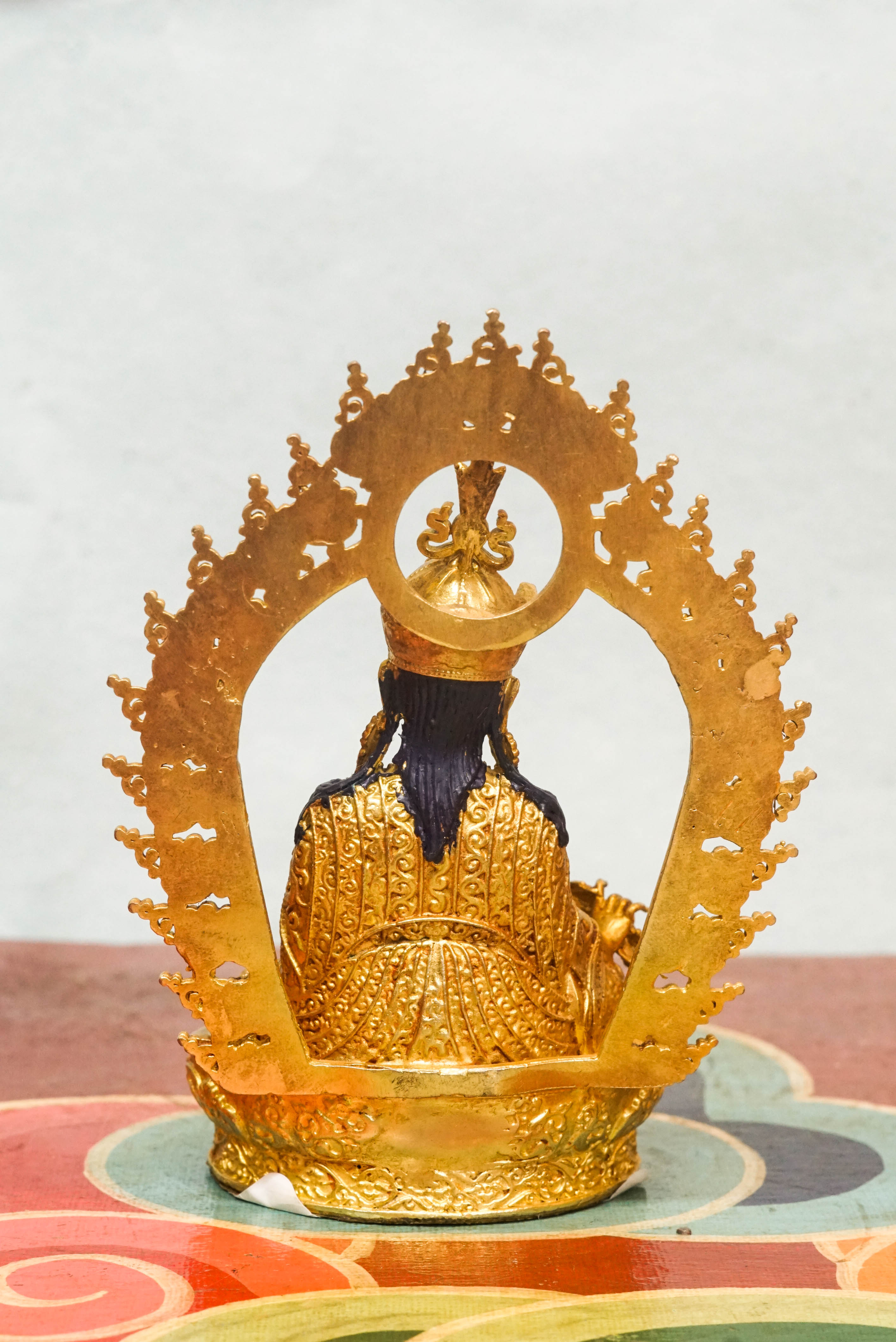 Statue of a guru, a spiritual teacher and guide, symbolizing wisdom, compassion, and the transmission of sacred teachings.
