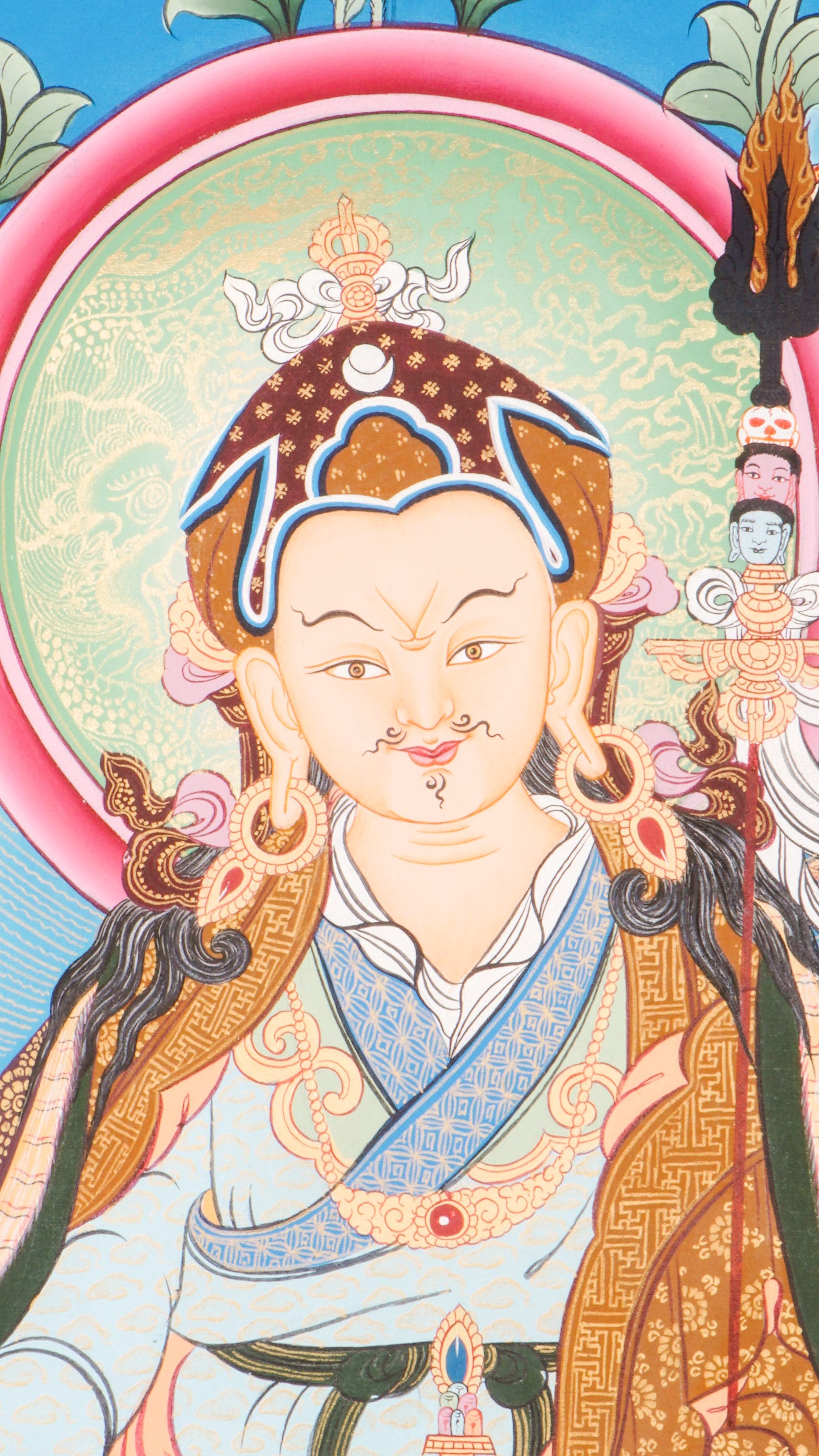 Guru Rinpoche Thangka is a Tibetan Buddhist painting of Padmasambhava, revered as the Second Buddha and a symbol of spiritual power and protection. This hand-painted thangka enhances meditation, brings blessings, and deepens your connection to Dharma teachings. 