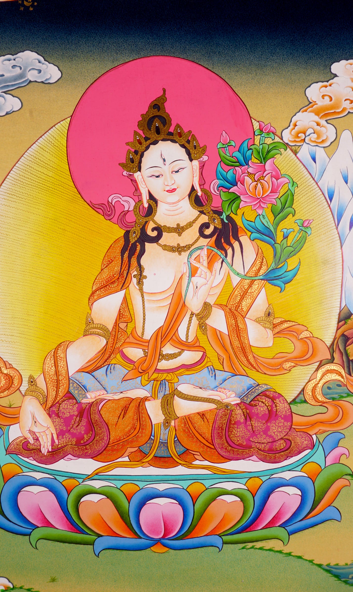 The White Tara Thangka Painting is a beautiful art symbolizing peace and is ideal for encouraging serenity and enlightenment in your home or sacred area.