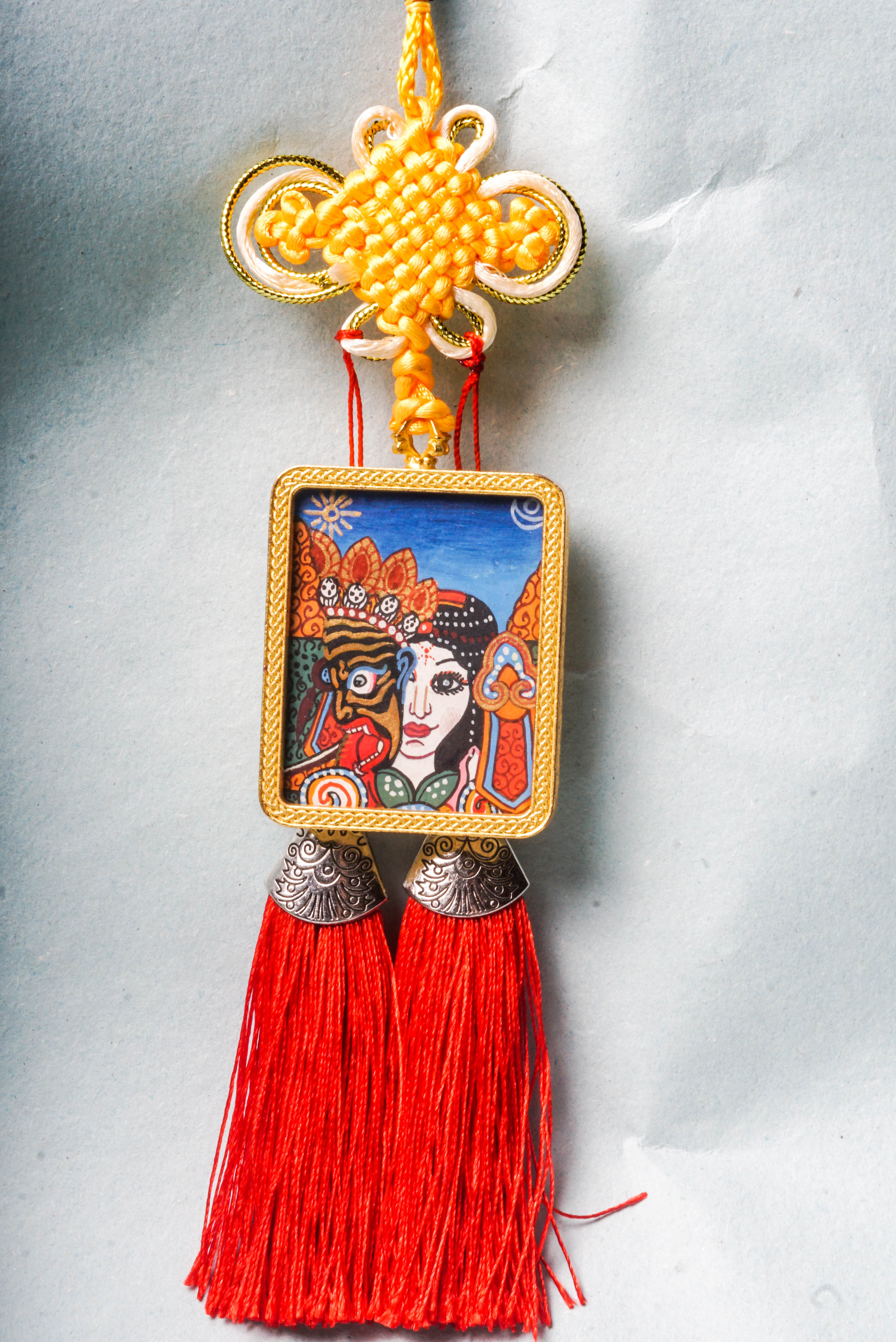 Kali, a powerful deity in Hindu and Tibetan Buddhism, symbolizes destruction of ignorance and spiritual transformation. This hand-painted Kali Ghau Thangka channels her protective energy for meditation and growth.