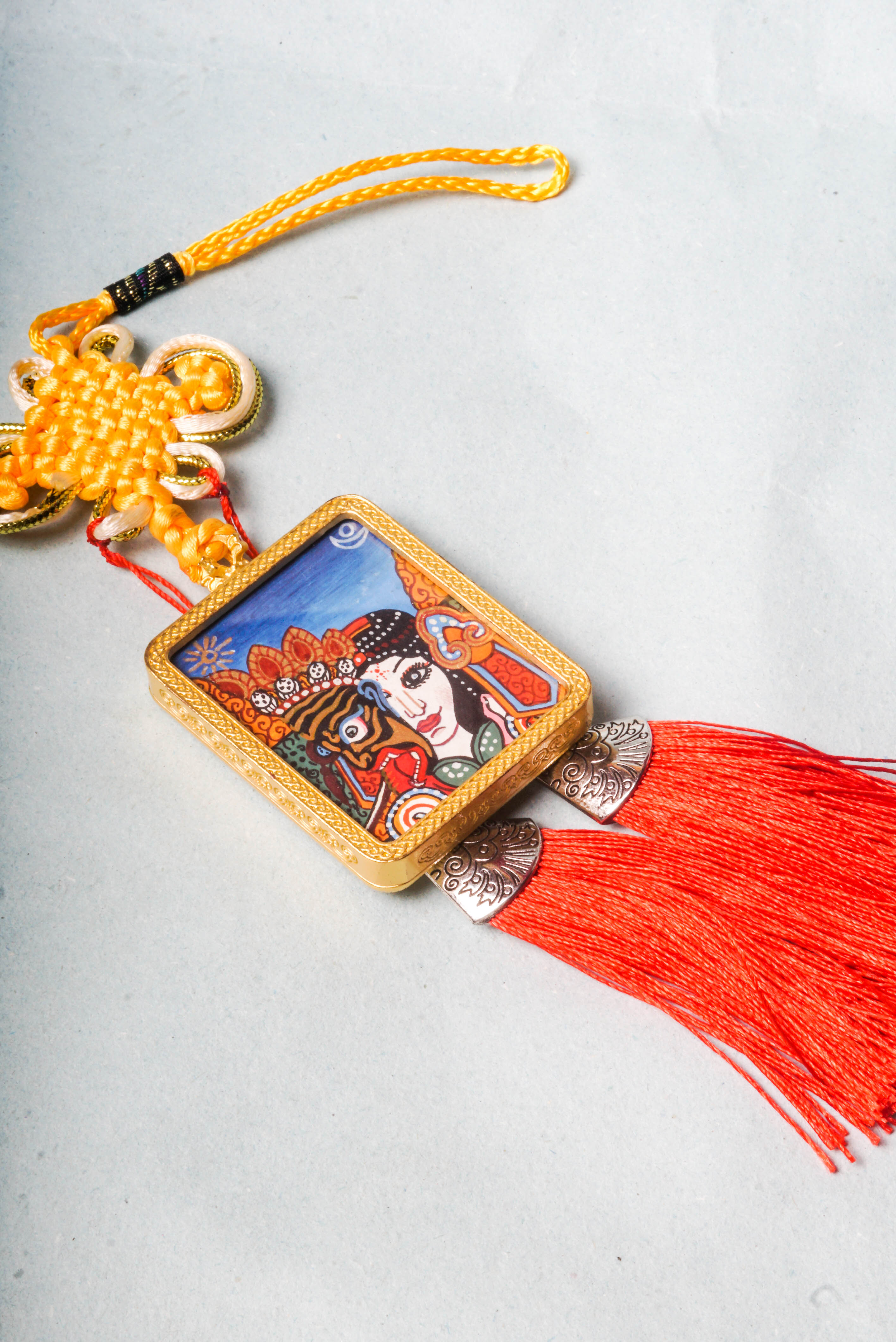 Kali, a powerful deity in Hindu and Tibetan Buddhism, symbolizes destruction of ignorance and spiritual transformation. This hand-painted Kali Ghau Thangka channels her protective energy for meditation and growth.