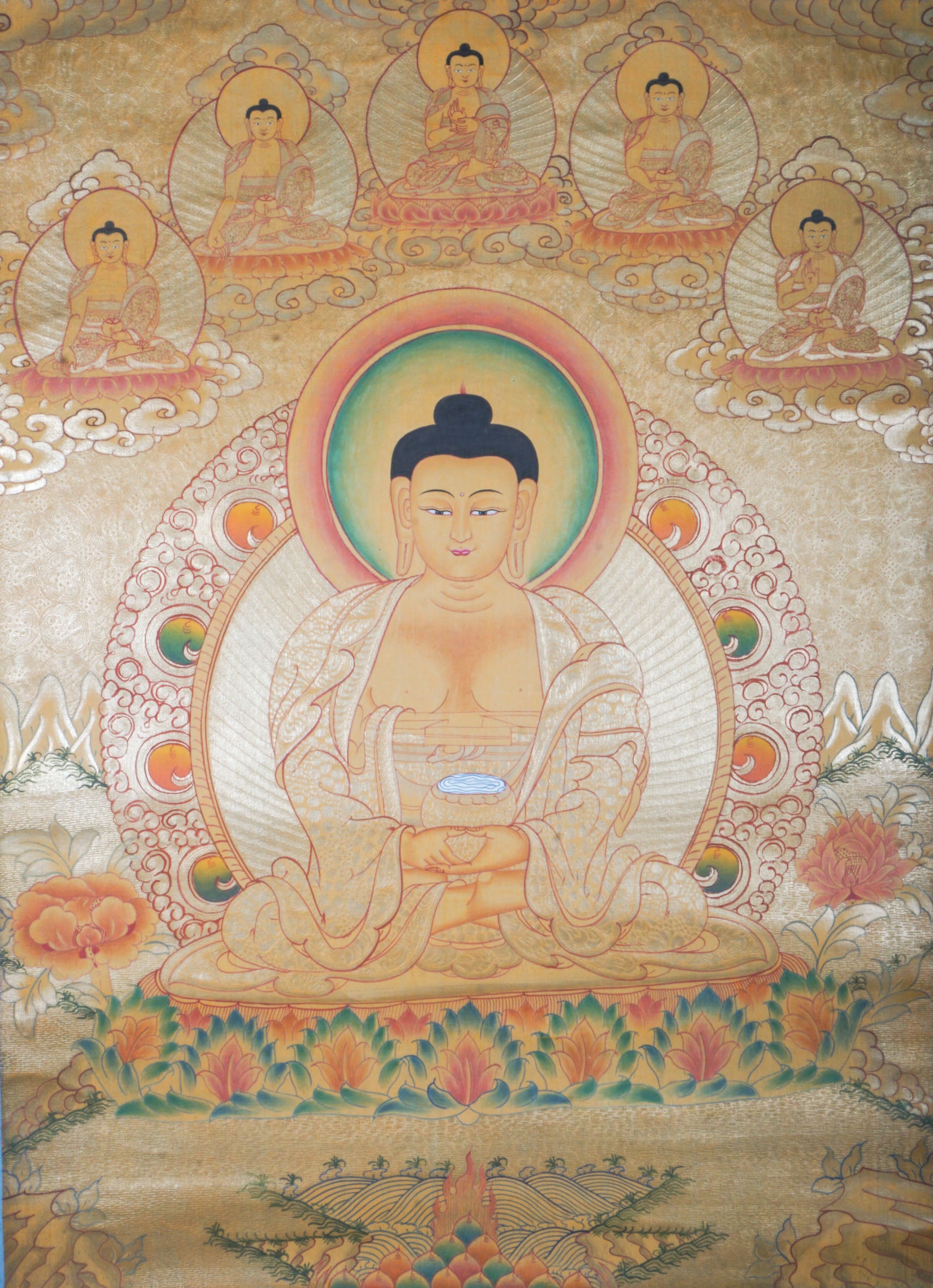 Amitabha Buddha on Gold Background - a depiction of a seated Buddha figure with decorative elements on a textured background