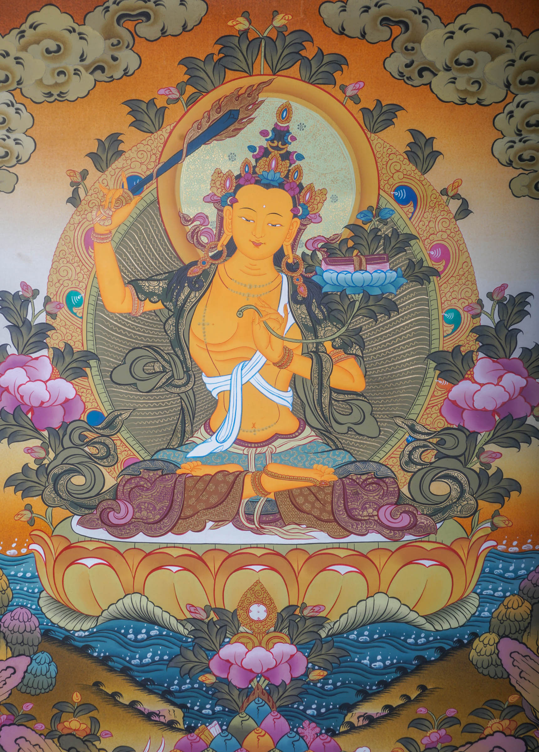 The Manjushri Thangka Painting showcases precision and vividness in the depiction of discernment and enlightenment.