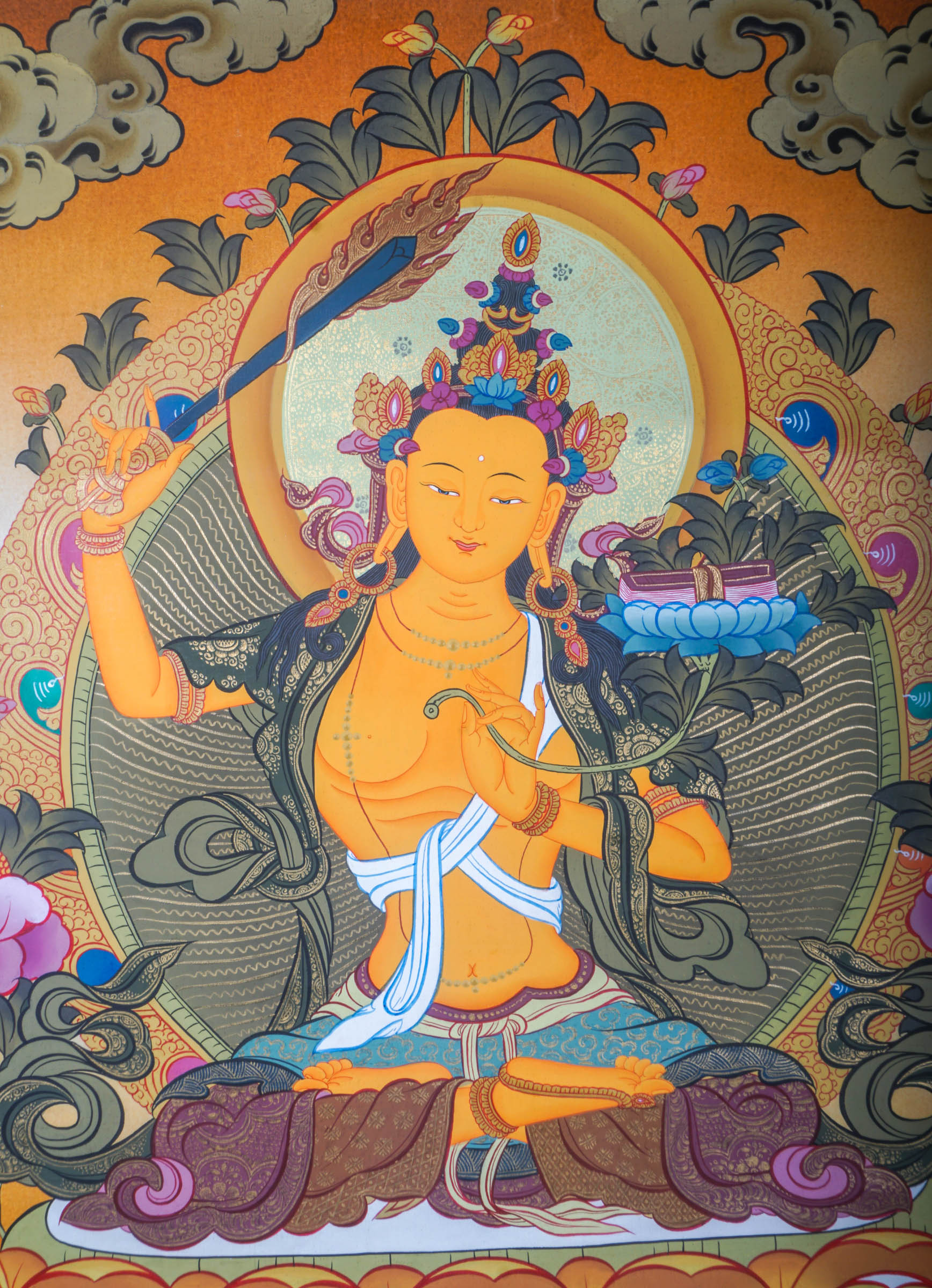 The Manjushri Thangka Painting showcases precision and vividness in the depiction of discernment and enlightenment.