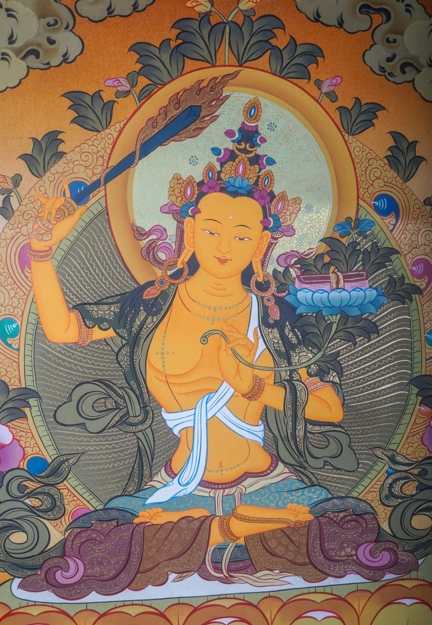 The Manjushri Thangka Painting showcases precision and vividness in the depiction of discernment and enlightenment.