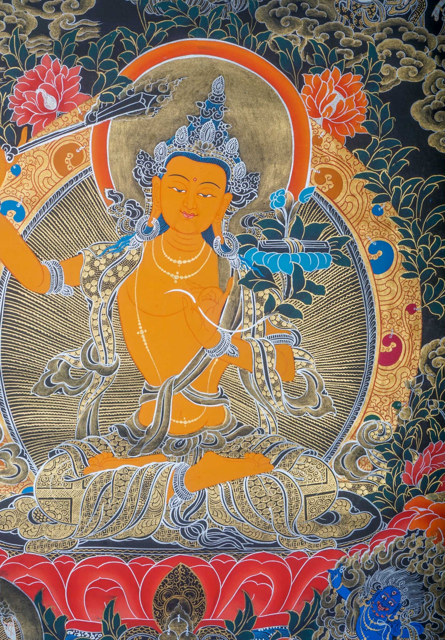 This handmade Manjushri Thangka Painting embodies the divine wisdom and beauty of Manjushri