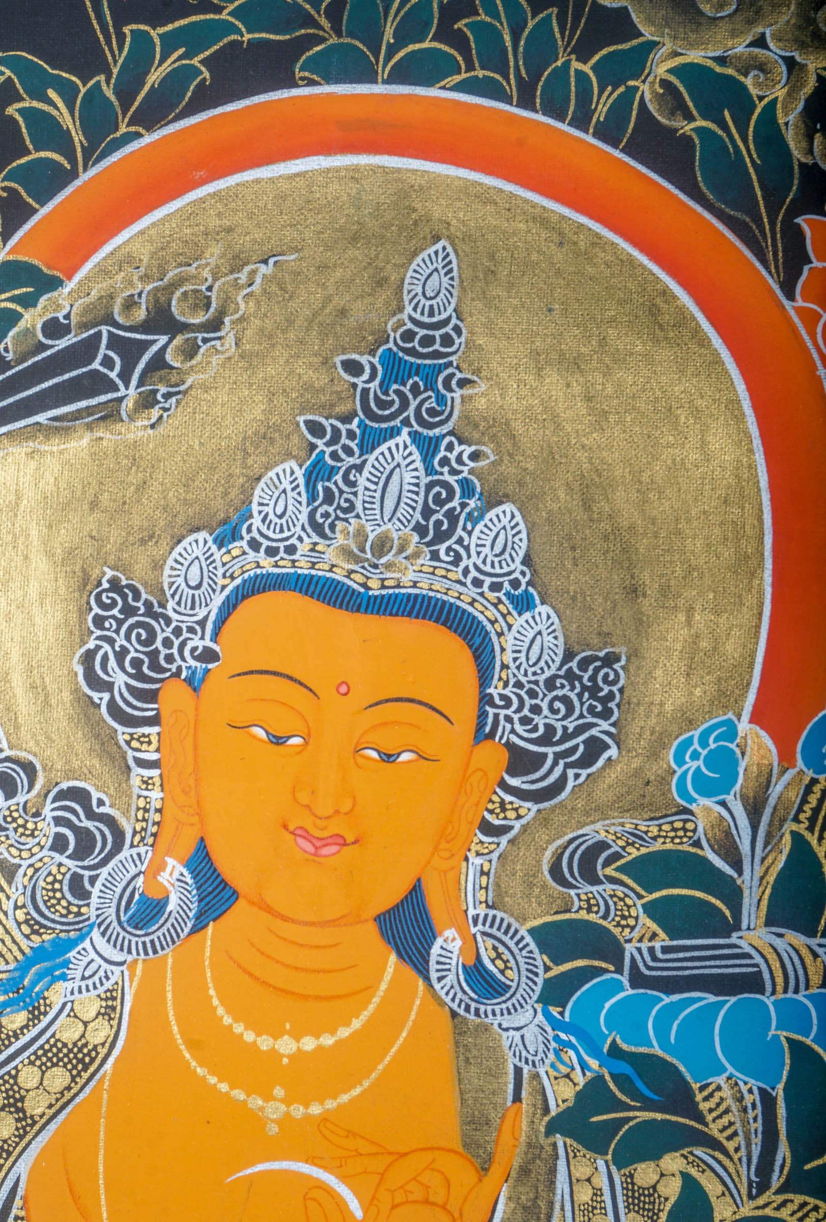 This handmade Manjushri Thangka Painting embodies the divine wisdom and beauty of Manjushri