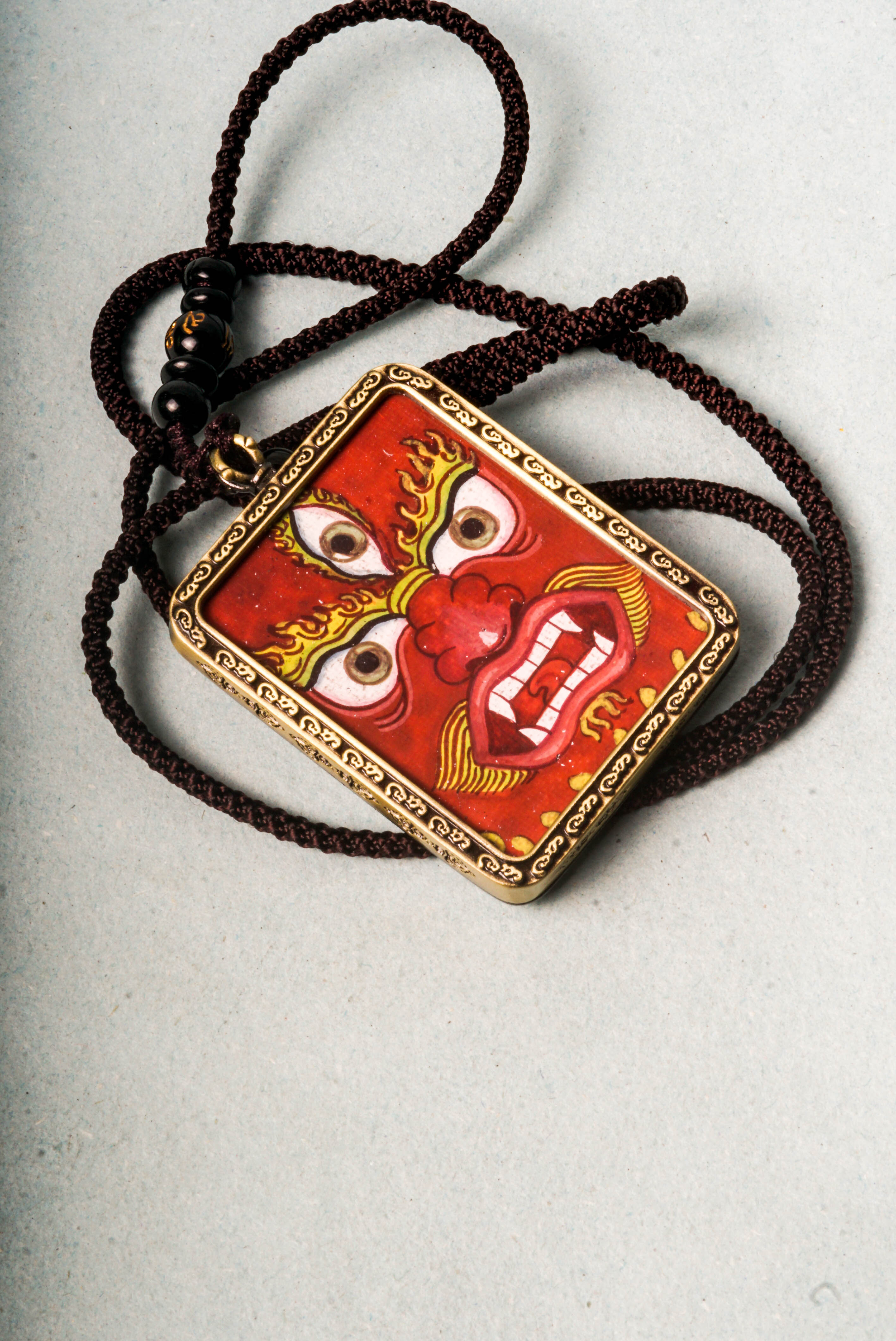 This genuine Mahakala Ghau Thangka embodies fierce protection and transformative power, hand-painted with natural mineral pigments to reflect his role as a Dharma guardian. A portable shrine and spiritual talisman, it supports meditation, wards off negativity, and strengthens your spiritual practice.
