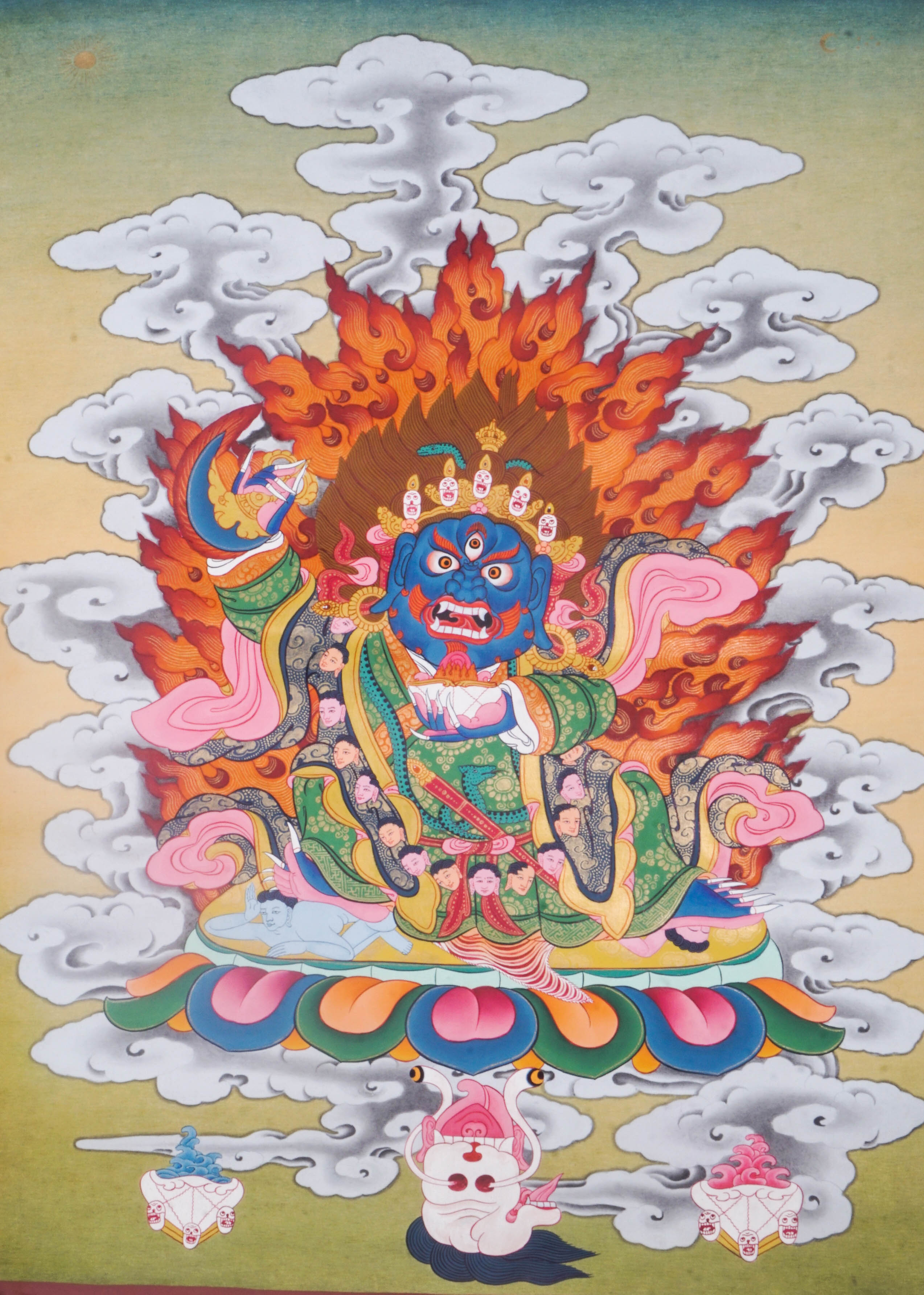 Mahakala is a fierce protector in Tibetan Buddhism, known for removing obstacles and safeguarding the Dharma. This vibrant Thangka painting captures his powerful presence with traditional artistry, making it a striking focal point for meditation and spiritual protection.
