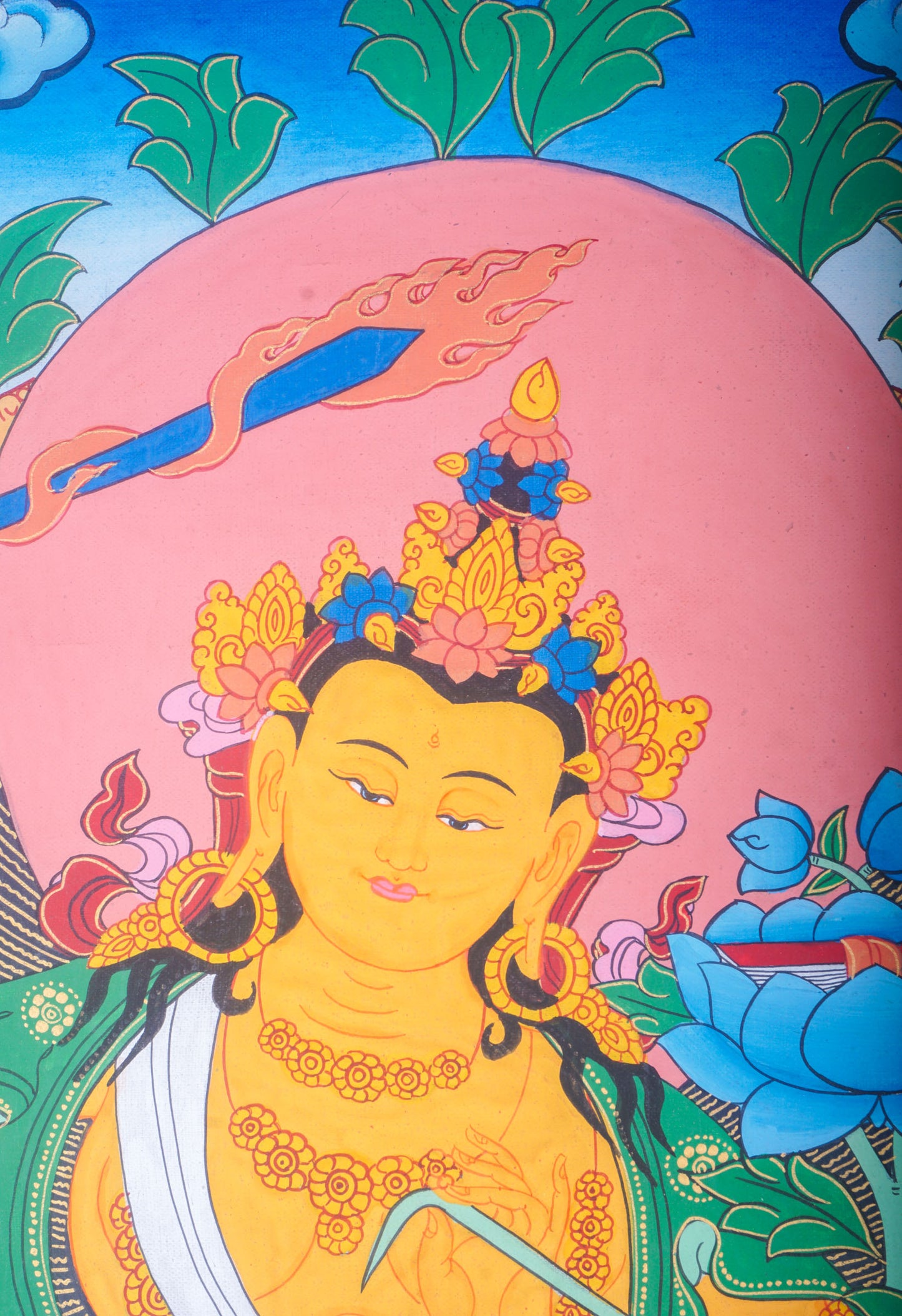 Handmade Thangka Painting of Manjushri embodies the essence of wisdom that dispels the darkness of ignorance