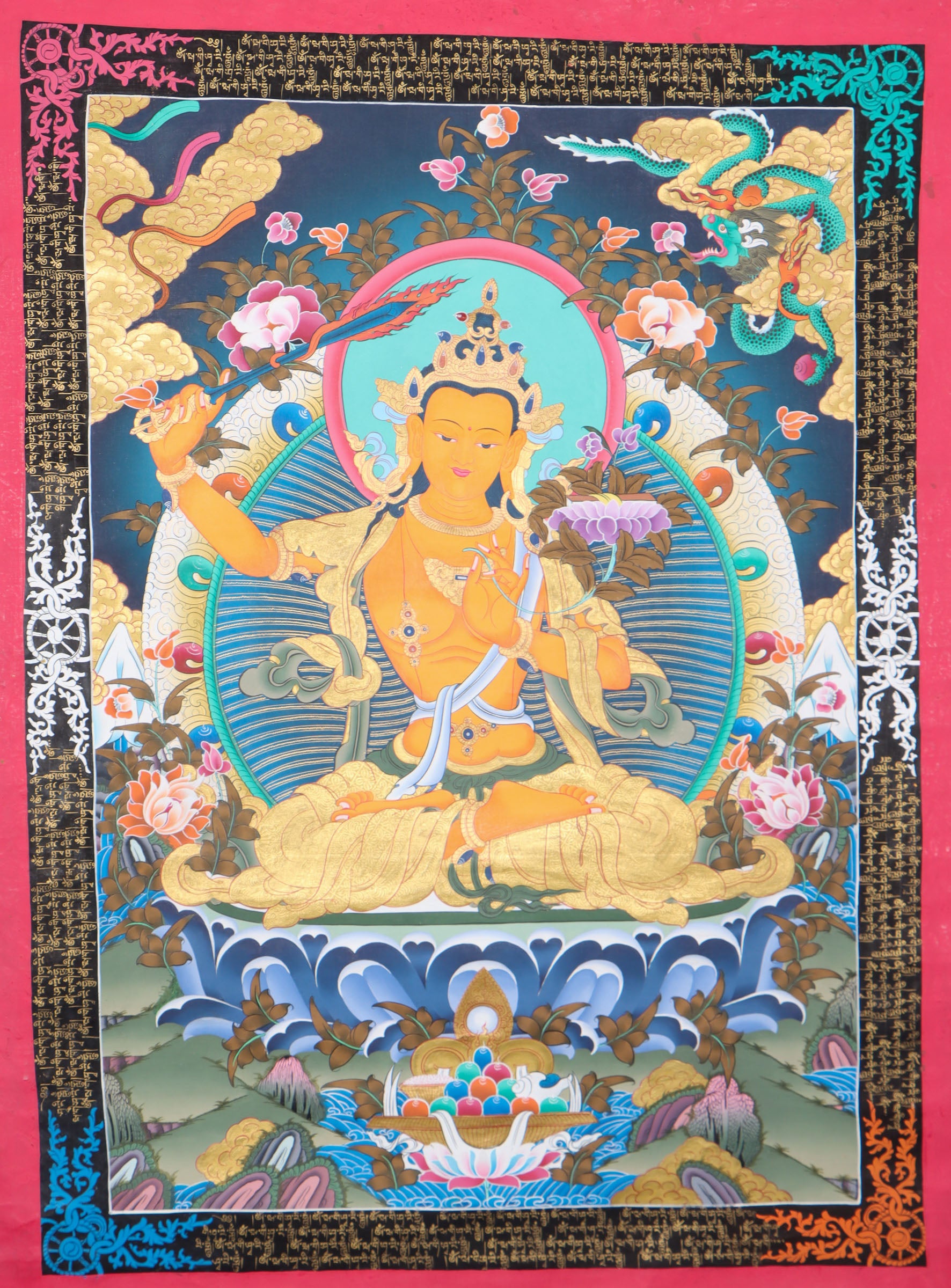 This genuine Manjushri Thangka captures the Bodhisattva of wisdom holding his iconic sword and scripture, symbolizing the power to cut through ignorance and reveal ultimate truth. Hand-painted with natural mineral pigments on canvas, it is a powerful spiritual tool for those seeking clarity, insight, and enlightenment.