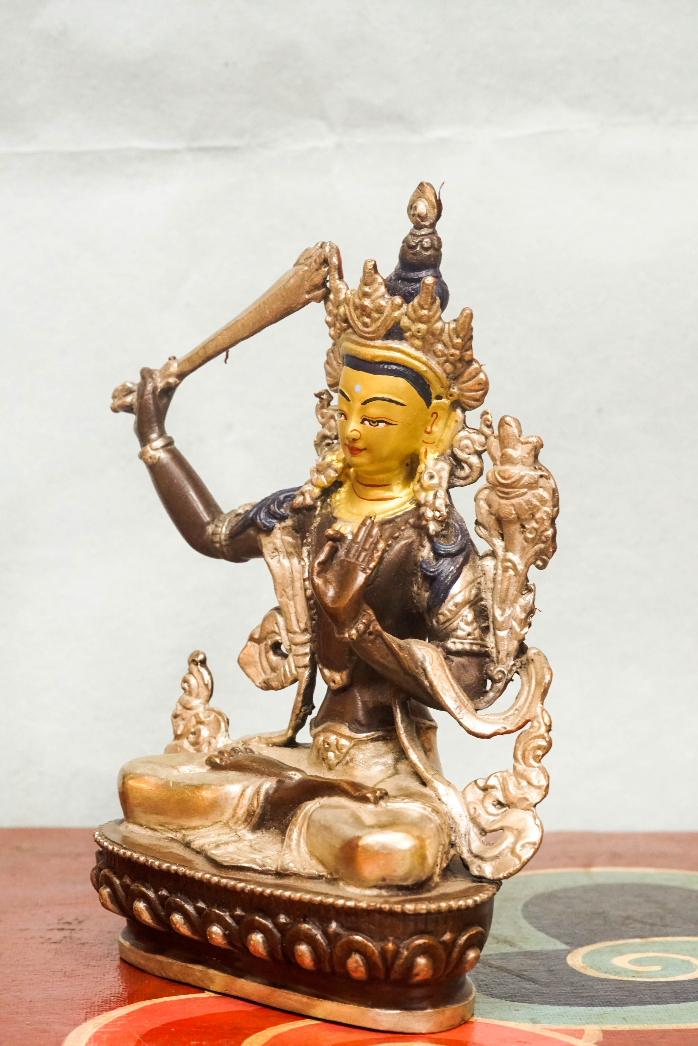 Statue of Manjushri, the Bodhisattva of Wisdom, serving powerful symbol for meditation, altar display, and spiritual growth.