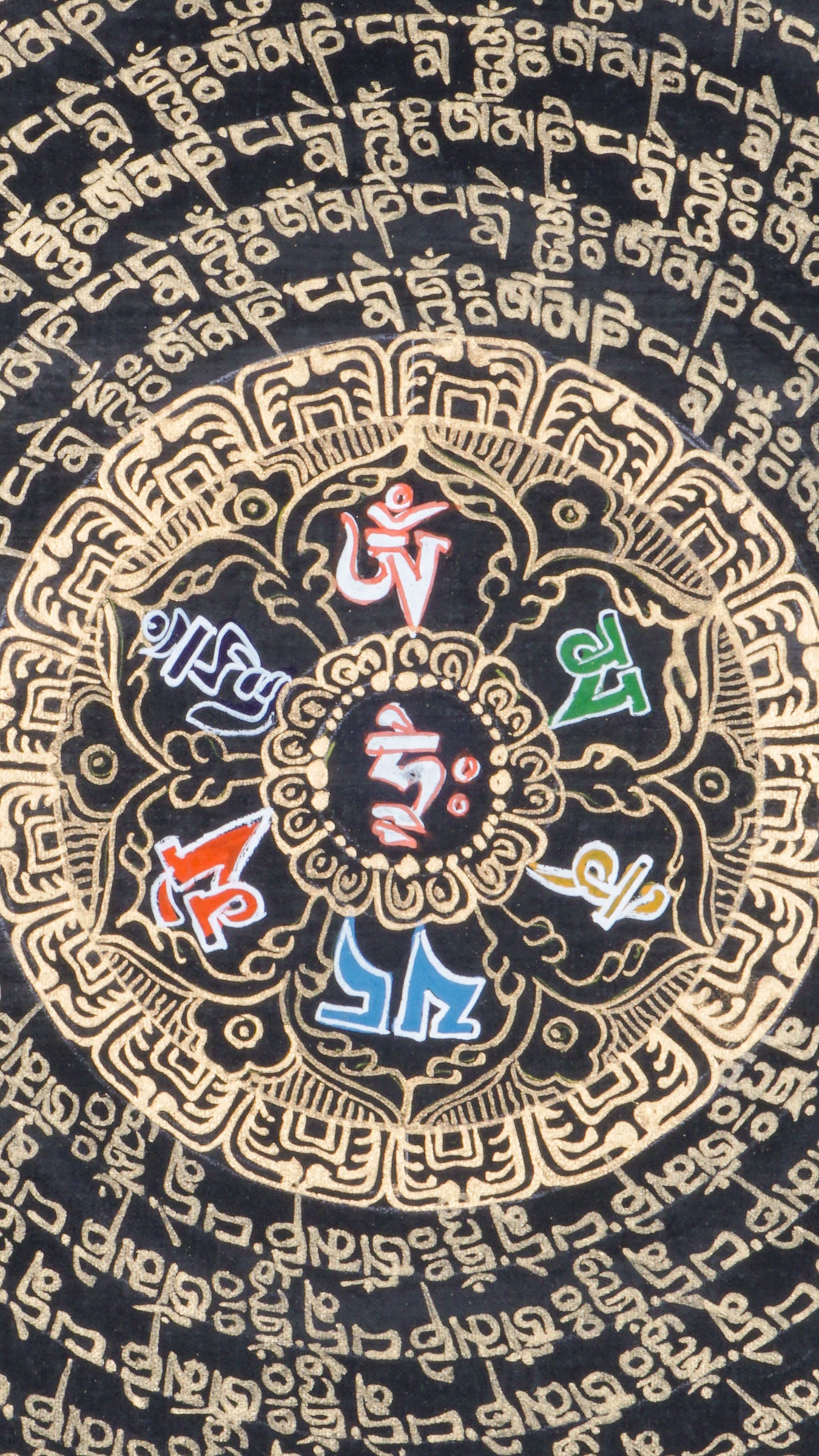 Tibetan mantra mandala thangka with concentric rings of Om Mani Padme Hum script, surrounded by four dragon guardians, ornate gold detailing, and jewel symbols on a black background.