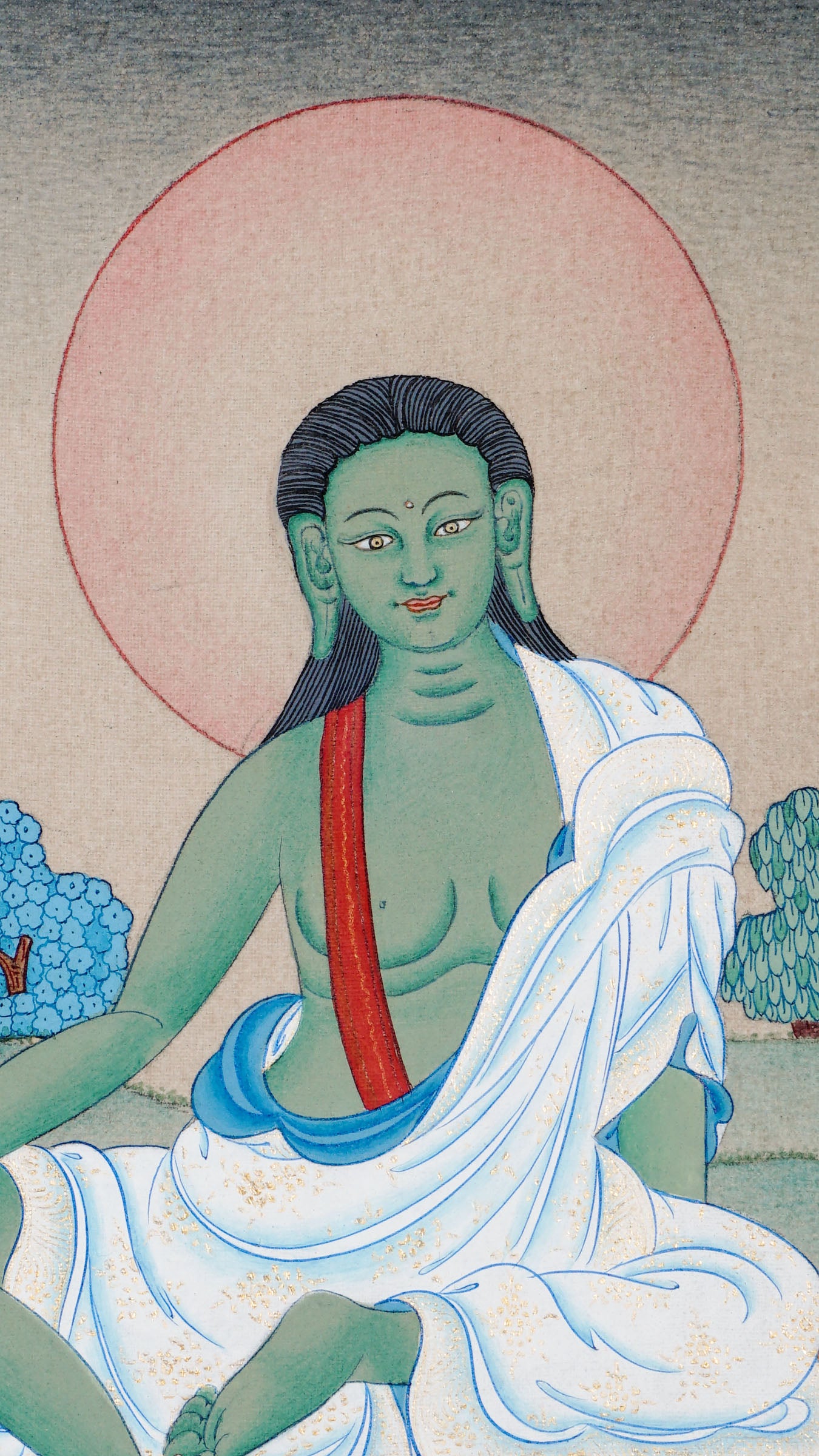 Tibetan thangka of Milarepa seated on a deer-skin mat with greenish body, hands resting calmly, surrounded by a peaceful landscape with trees and offerings.