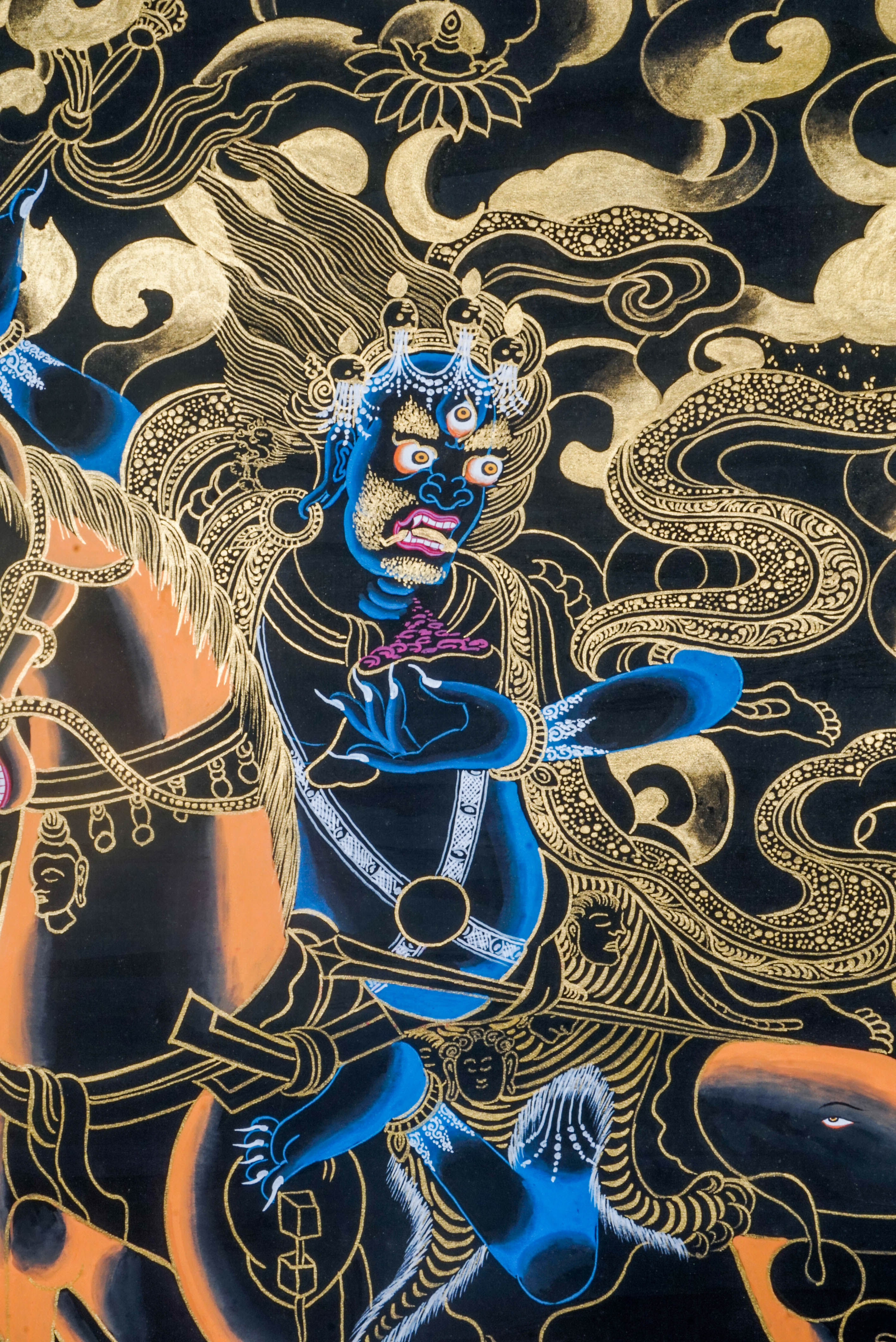 Palden Lhamo is a fierce protector deity in Tibetan Buddhism, symbolizing strength and the safeguarding of the Dharma. This vibrant Thangka, crafted with traditional techniques and gold leaf, captures her powerful energy and serves as a potent focus for meditation and spiritual protection in any sacred space.