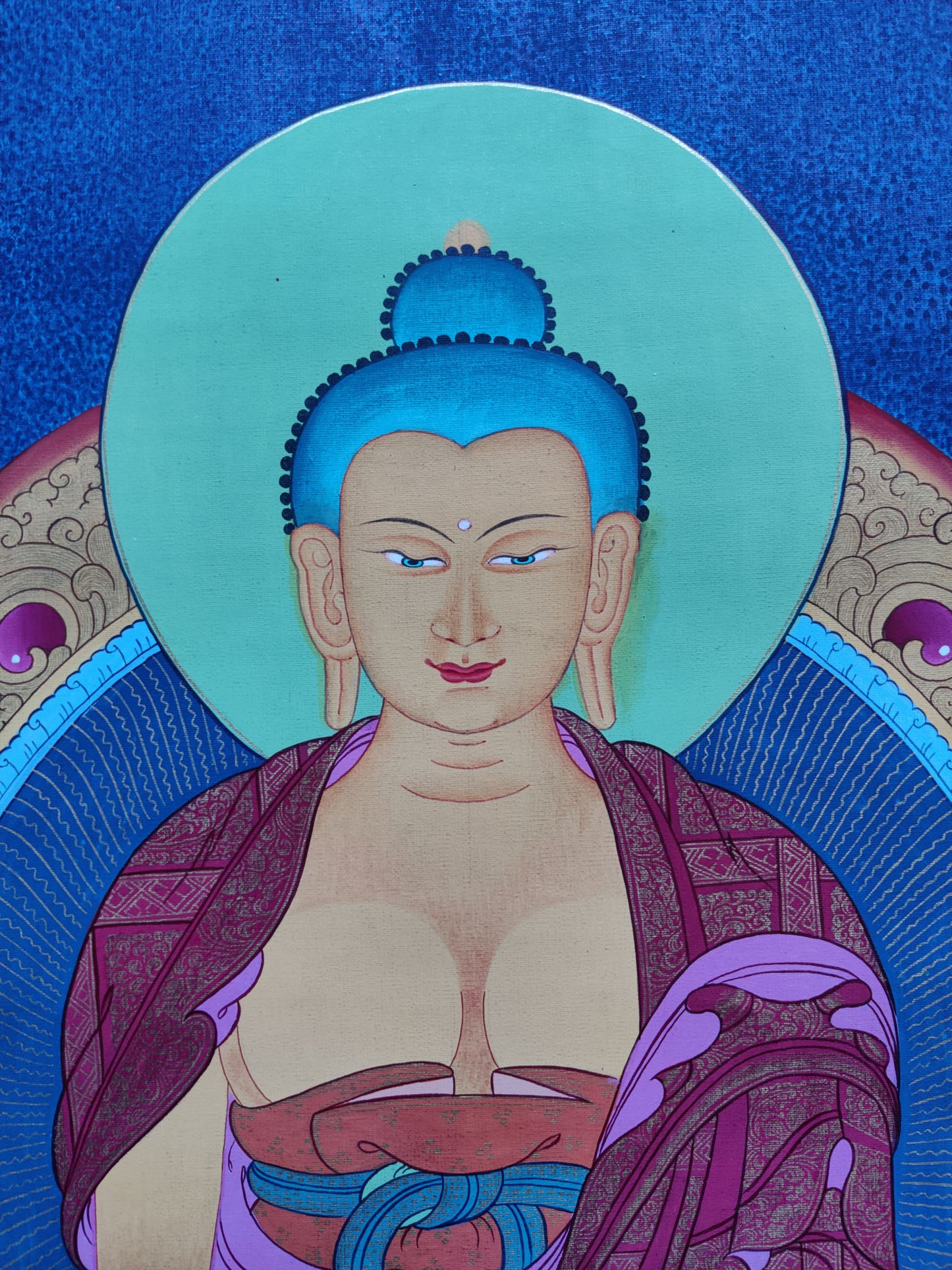 Our Shakyamuni Buddha Thangka showcases exquisite Tibetan craftsmanship and devotion