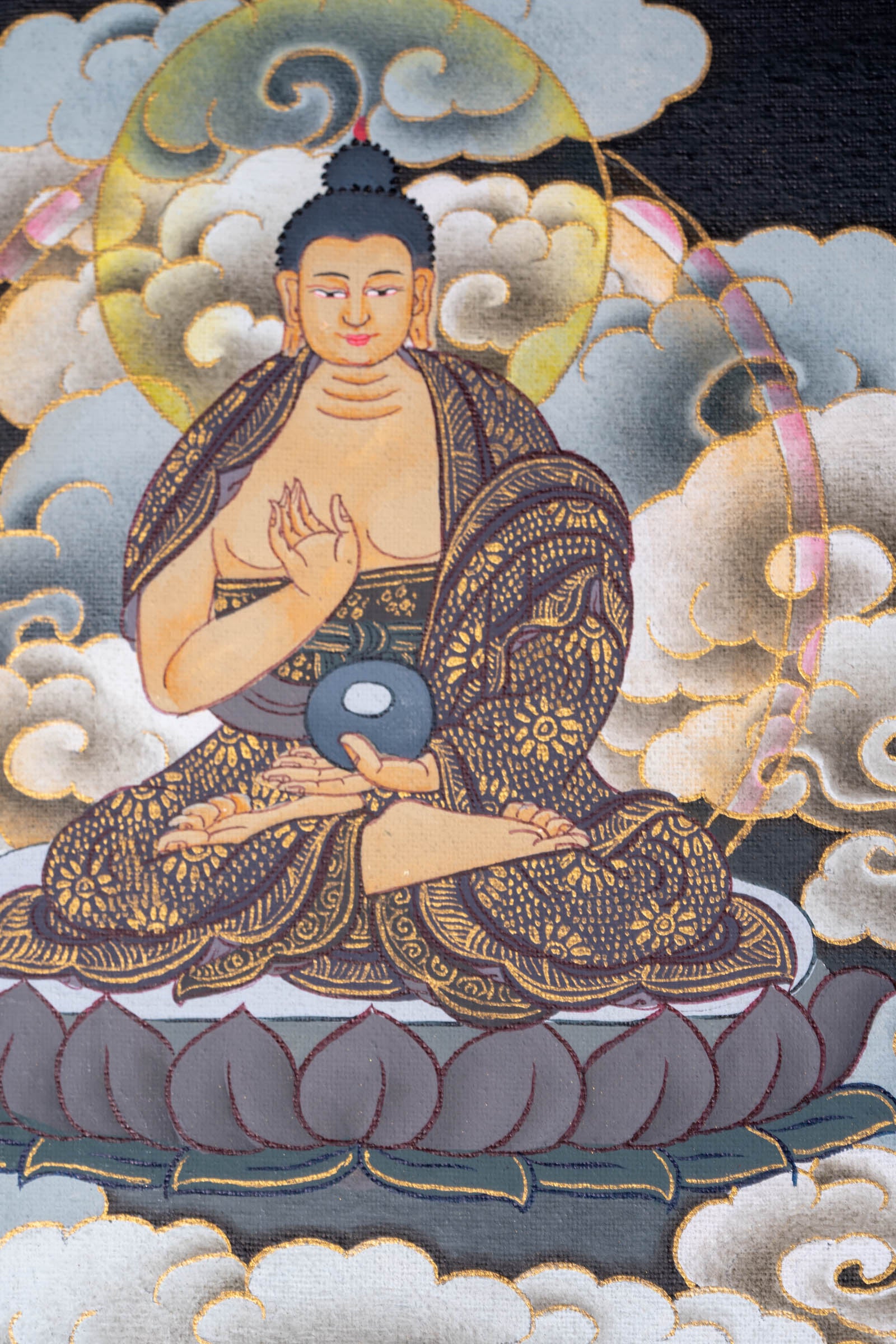This genuine Tibetan Thangka of Shakyamuni Buddha is hand-painted with natural pigments, capturing his enlightened presence in serene detail. A perfect addition to any meditation or sacred space, it reflects the essence of Buddhist wisdom and compassion.