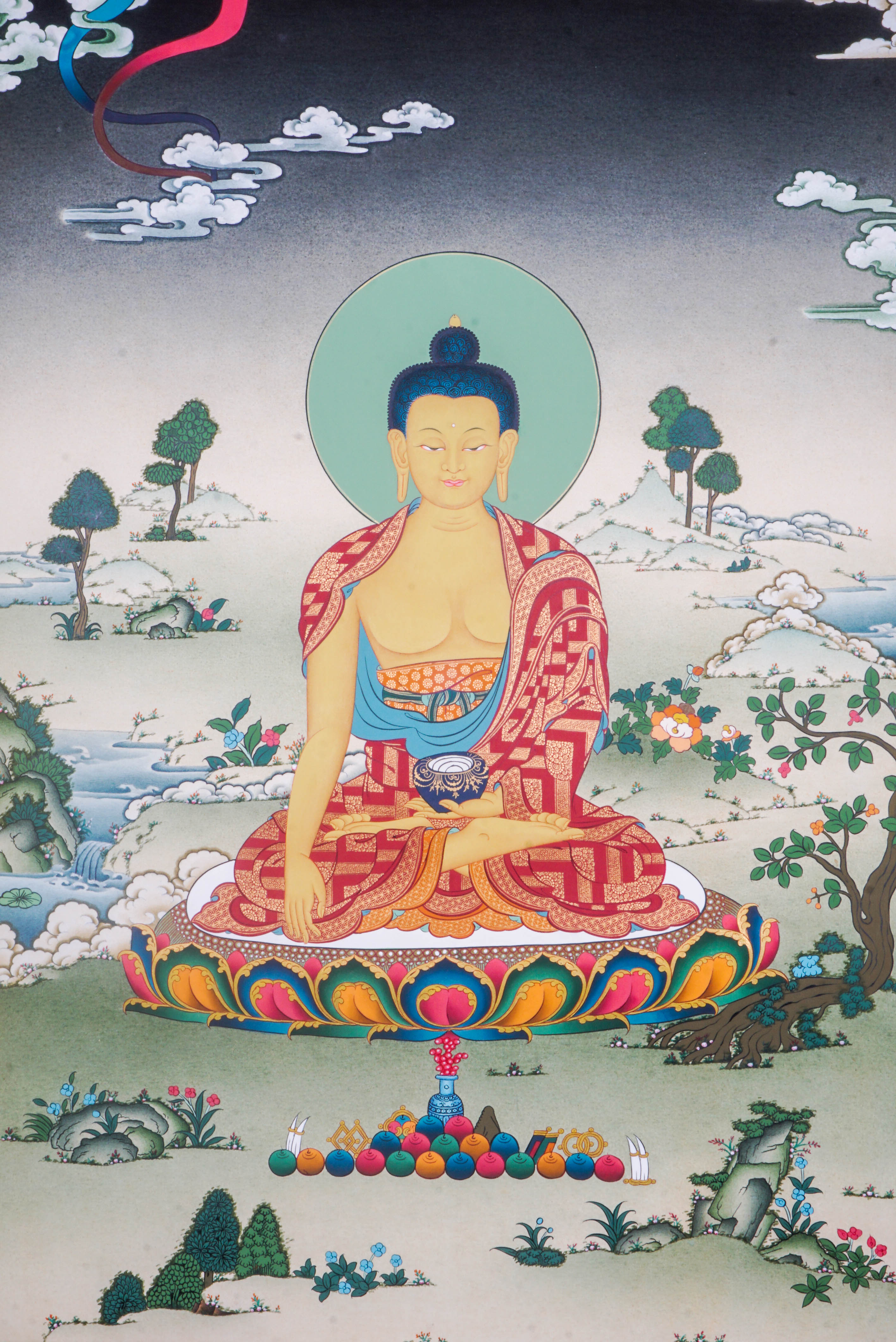 The Shakyamuni Buddha Thangka Painting depicts the Buddha of enlightenment in serene meditation, radiating peace, compassion, and spiritual wisdom. Hand-painted by skilled Tibetan artists with natural pigments, this exquisite artwork enhances any space with its vibrant detail and deep spiritual significance.