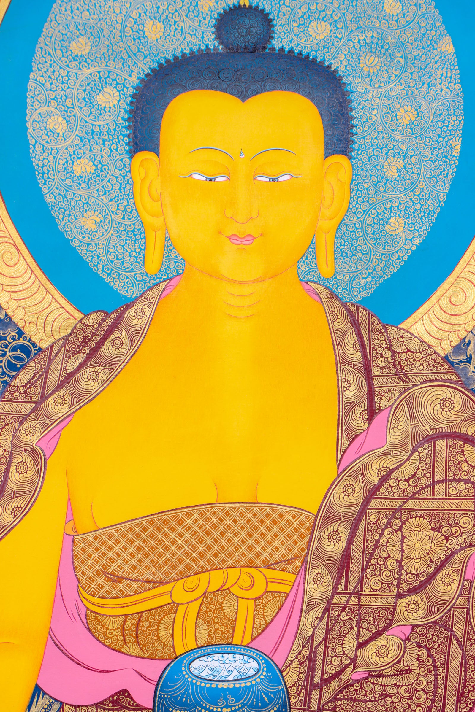 This genuine Tibetan thangka of Shakyamuni Buddha is hand-painted using natural mineral pigments, capturing the essence of the historical Buddha in deep meditation. A sacred symbol in Buddhism, it brings serenity and spiritual depth to any space seeking mindful energy and enlightenment.