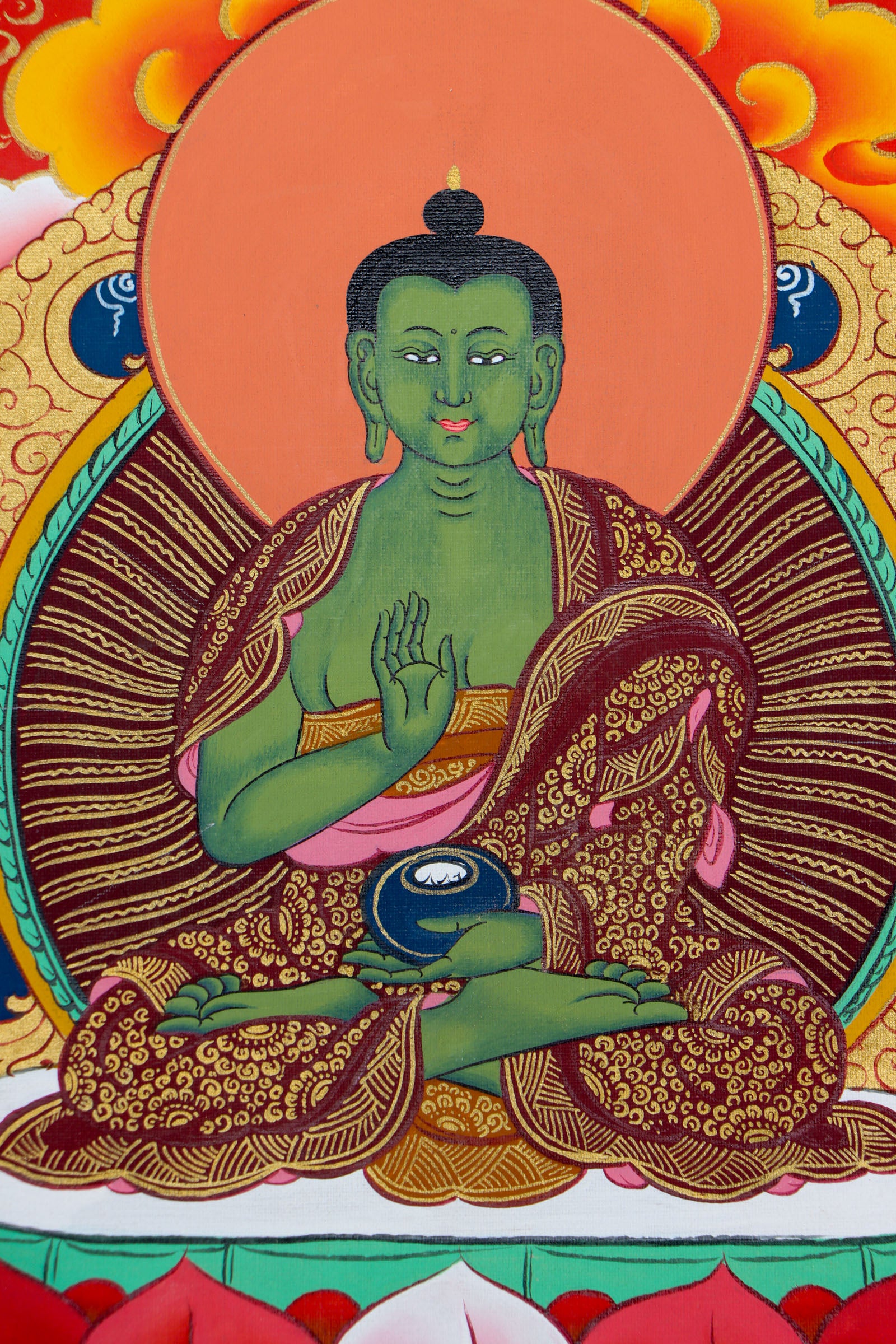 This genuine Tibetan thangka of Shakyamuni Buddha is hand-painted using natural mineral pigments, capturing the essence of the historical Buddha in deep meditation. A sacred symbol in Buddhism, it brings serenity and spiritual depth to any space seeking mindful energy and enlightenment.