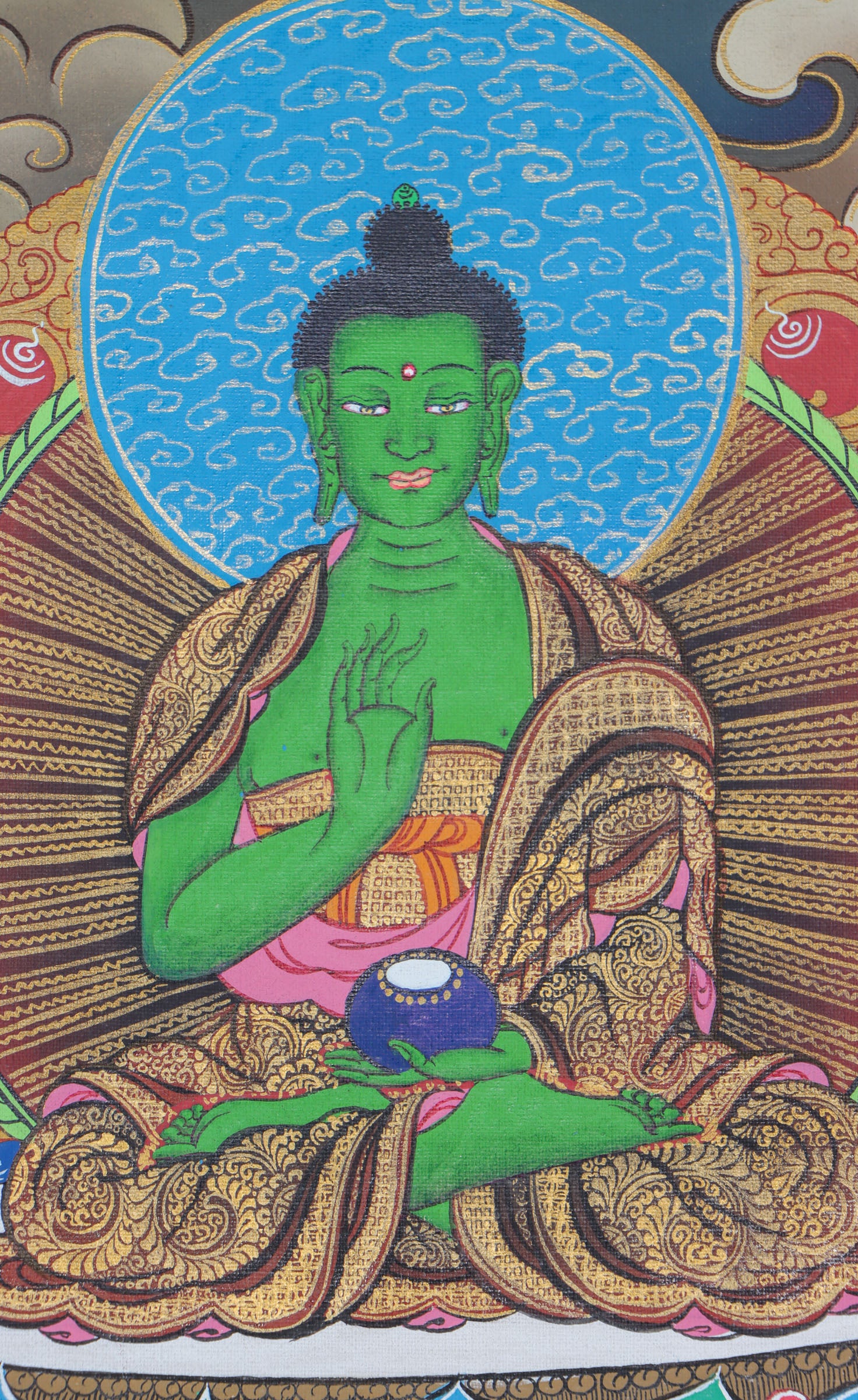 This exquisite Shakyamuni Buddha Thangka, hand-painted on cotton canvas using natural mineral pigments, radiates the peaceful essence of the Enlightened One and reflects the deep spiritual artistry of Tibetan culture.