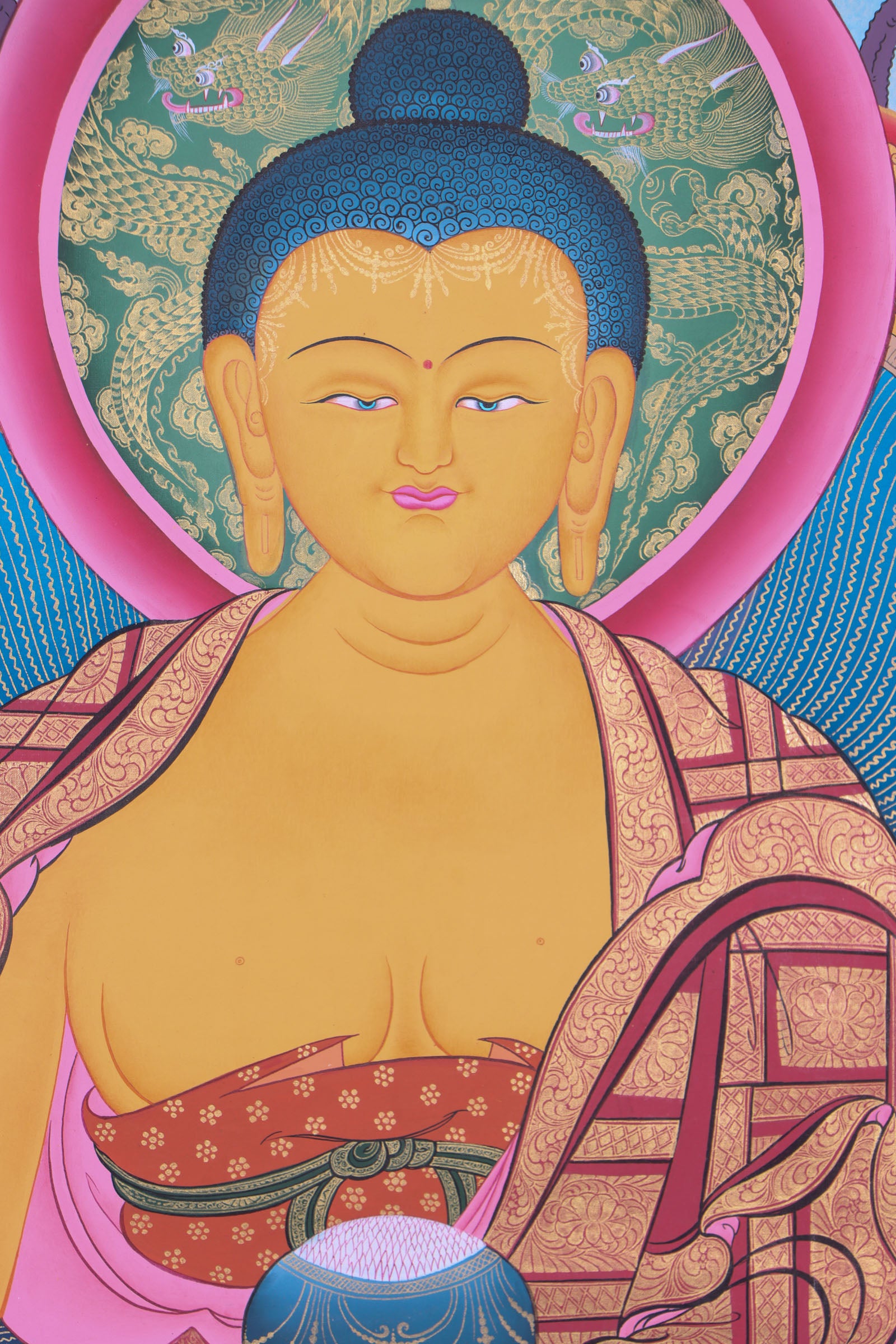 This genuine Tibetan thangka of Shakyamuni Buddha is hand-painted on cotton canvas using natural mineral pigments, capturing his serene meditative presence. A sacred Buddhist artwork, it embodies the teachings of enlightenment and brings spiritual calm to any space.