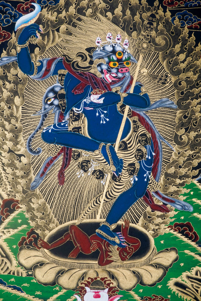 Simhamukha, the Lion-Faced Dakini, is a fierce protector in Tibetan Buddhism, symbolizing wisdom that cuts through ignorance and negativity. This hand-painted Thangka, crafted with natural pigments by skilled artisans, invites clarity, strength, and spiritual protection into your space.