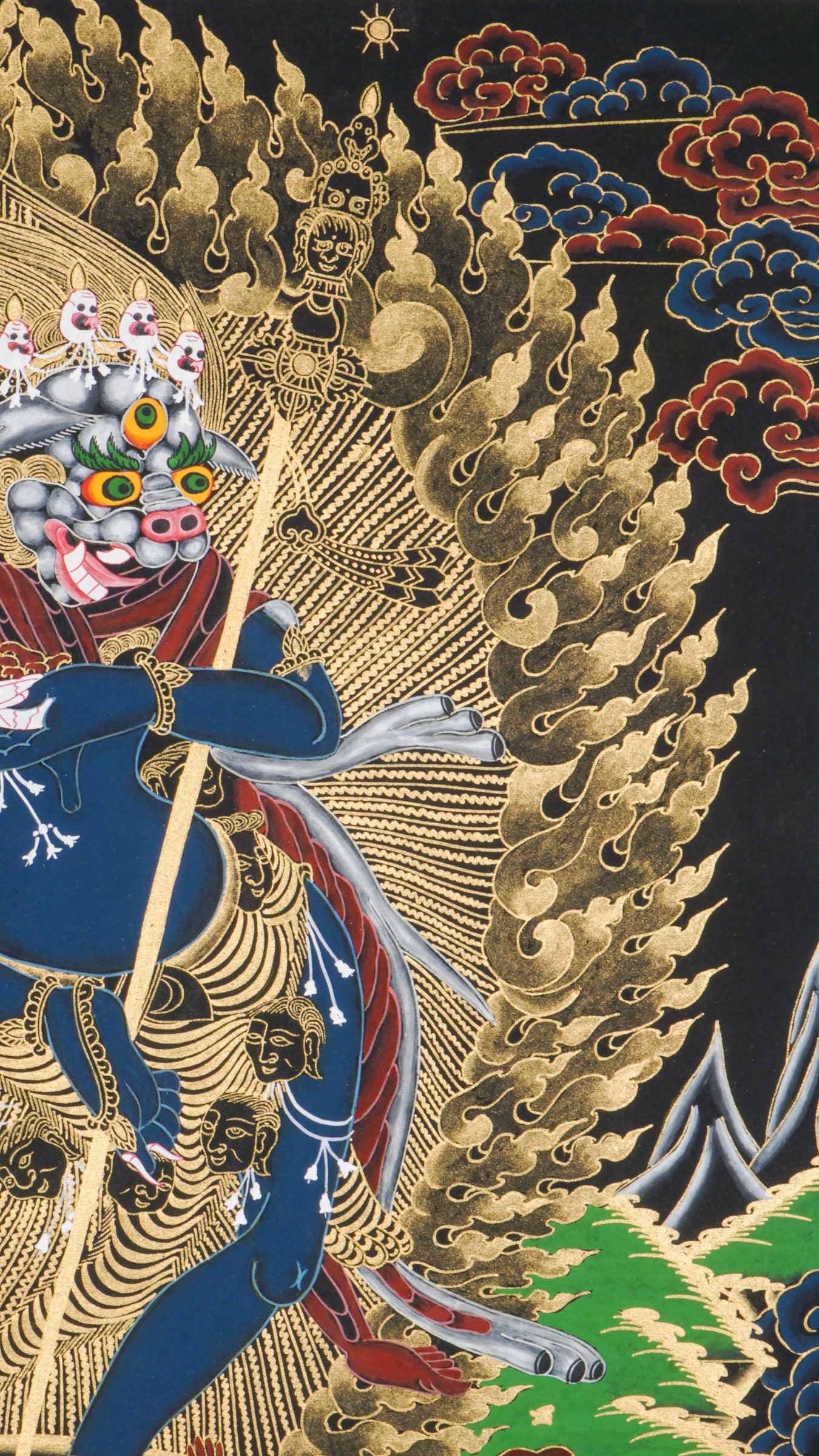 Traditional Tibetan thangka painting depicting Singh Mukhi, the lion-faced protector dakini, shown in a dynamic dancing pose on a lotus base, surrounded by radiant gold flames and intricate symbolic patterns on a dark background.