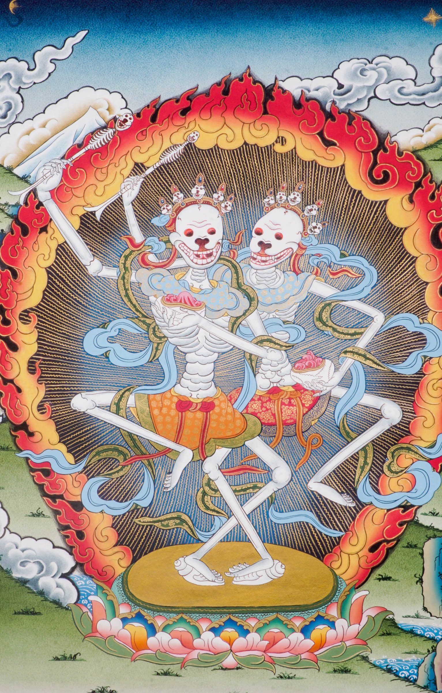 Traditional Tibetan thangka painting depicting the Skeleton Dance (Chitipati), showing two crowned skeleton figures dancing together within a ring of flames, surrounded by clouds and a symbolic landscape.