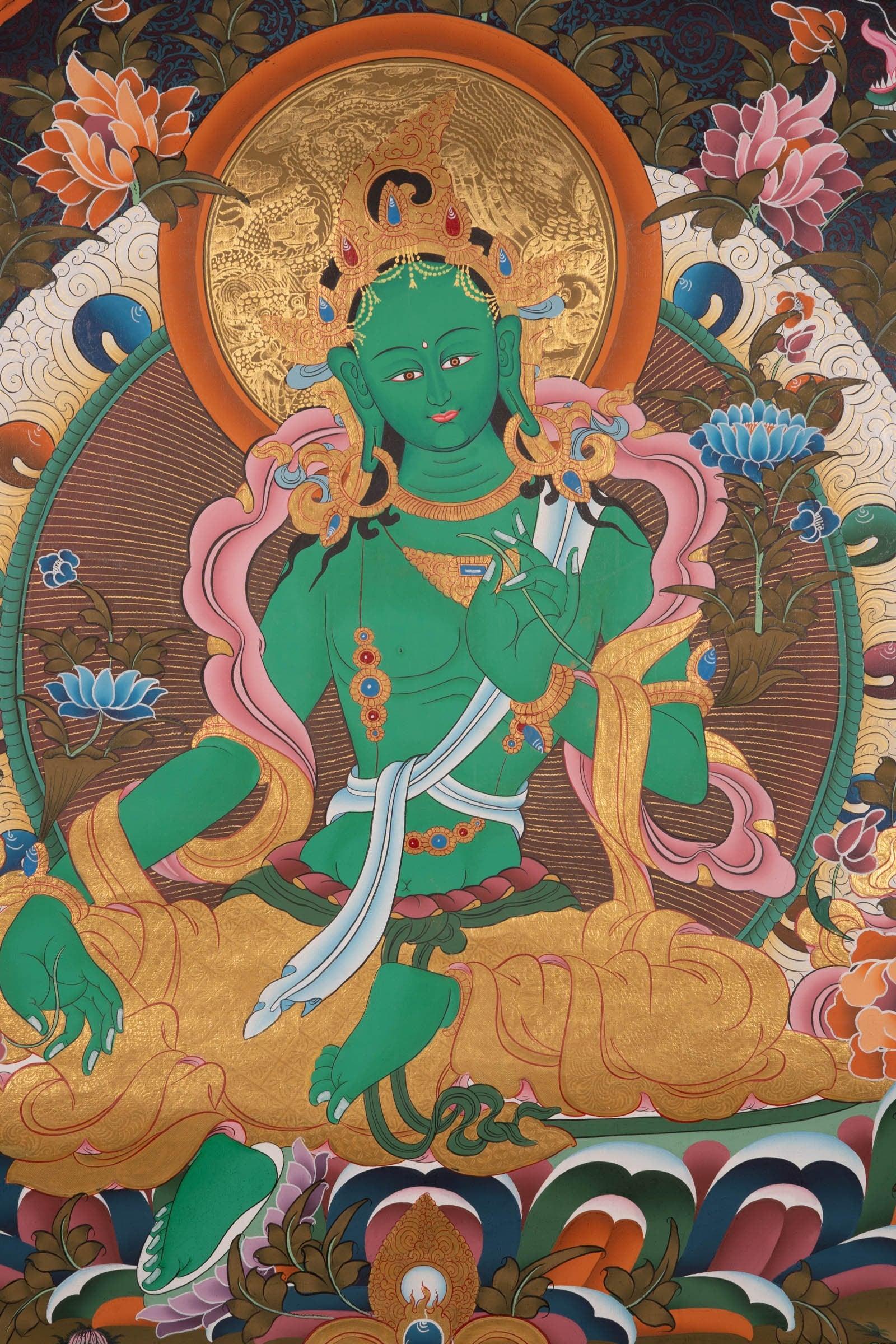 This hand-painted Thangka is a spiritual portal that invites you to immerse yourself in the divine energy of Green Tara.